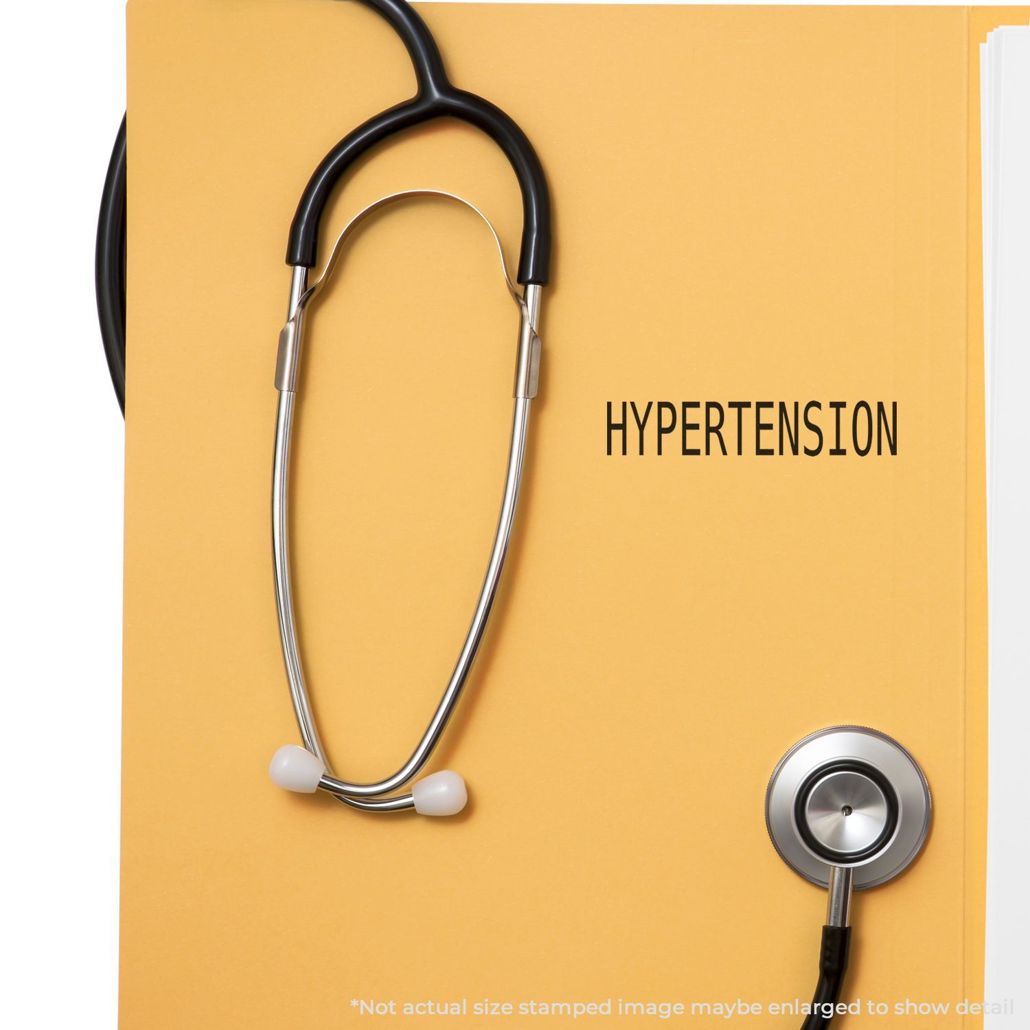 Stethoscope on yellow medical background with text HYPERTENSION, highlighting blood pressure condition for awareness and treatment.