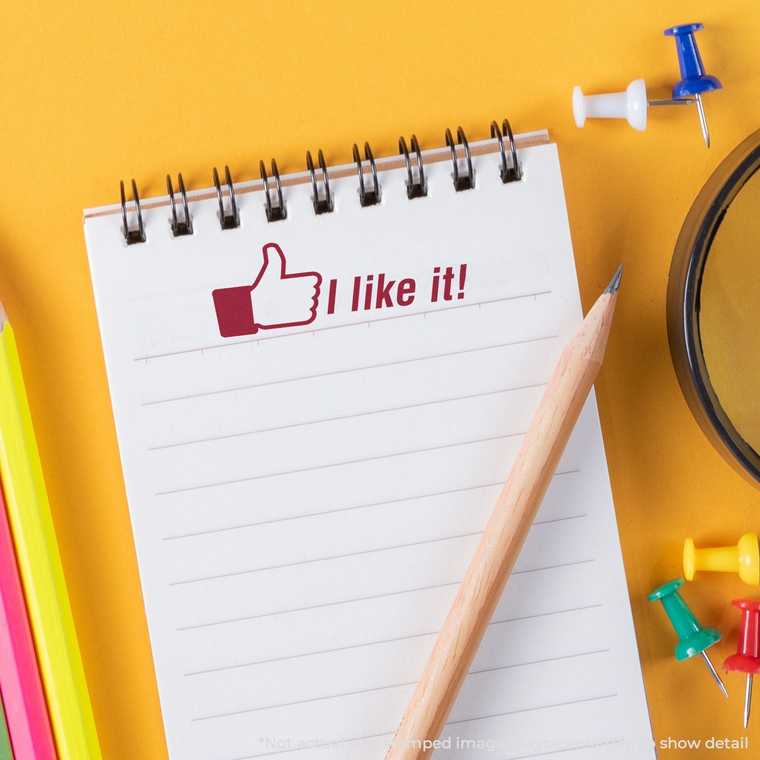 Yellow desk stationery with notepad showing thumbs-up and I like it!social media engagement call-to-action marketing image