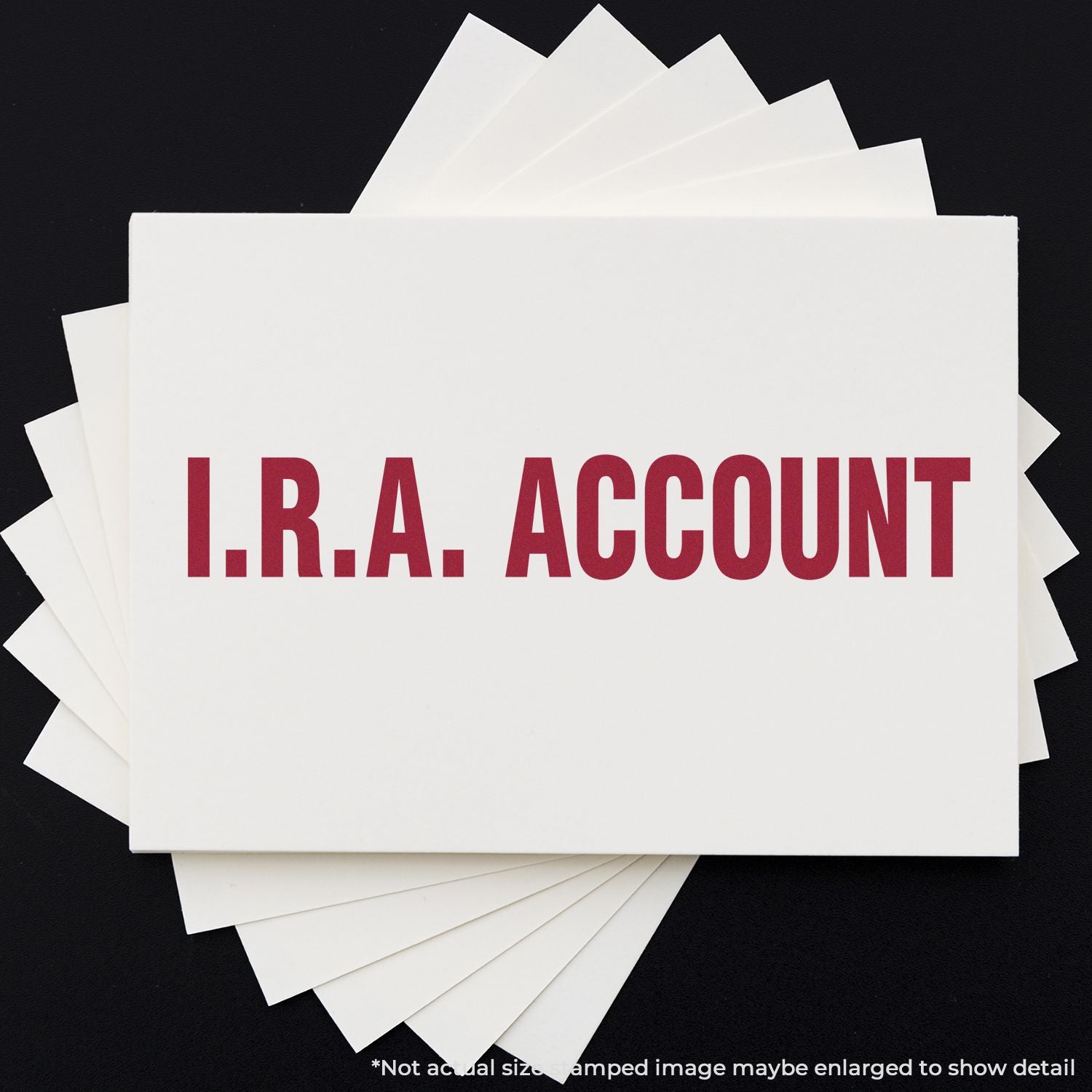 Stack of white account documents labeled I.R.A. ACCOUNT, representing individual retirement account bookkeeping and records paperwork.
