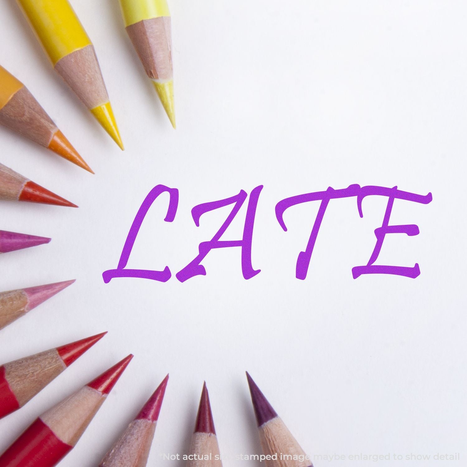 Colored pencils framing the word LATE on a white background, concept for deadline or procrastination.