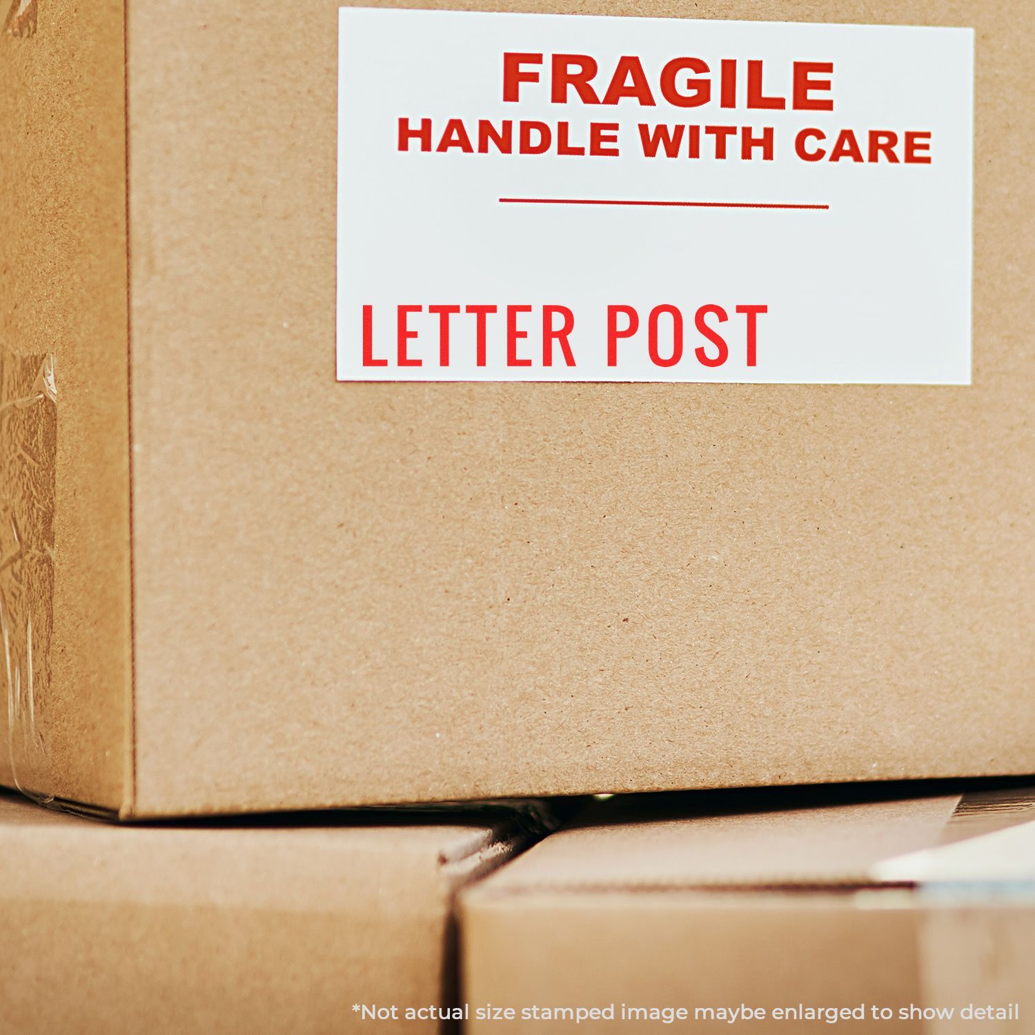 Fragile handle with care letter post shipping label on cardboard package, indicating delicate mail delivery instructions for couriers.