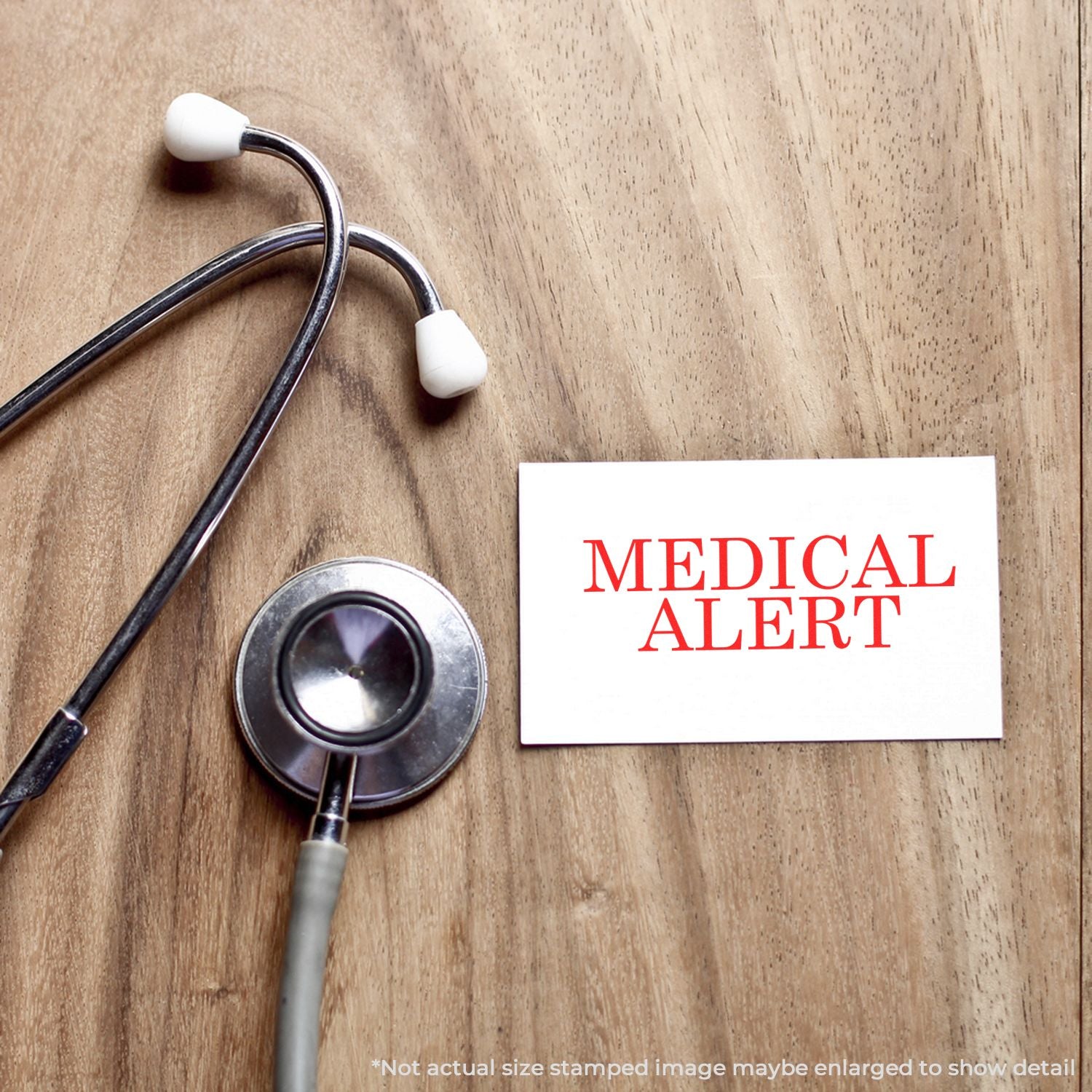 Stethoscope beside a medical alert card on a wooden surface, healthcare and emergency warning concept.