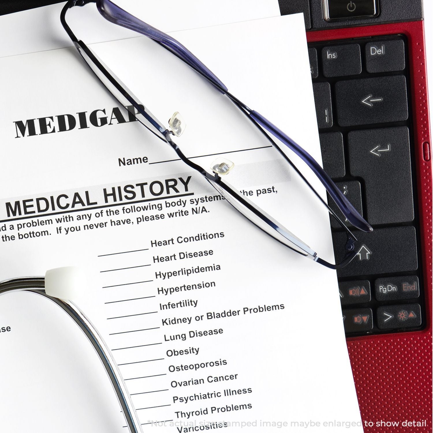 Medical history form with stethoscope and keyboard, highlighting heart disease and other health conditions for clinical data entry.