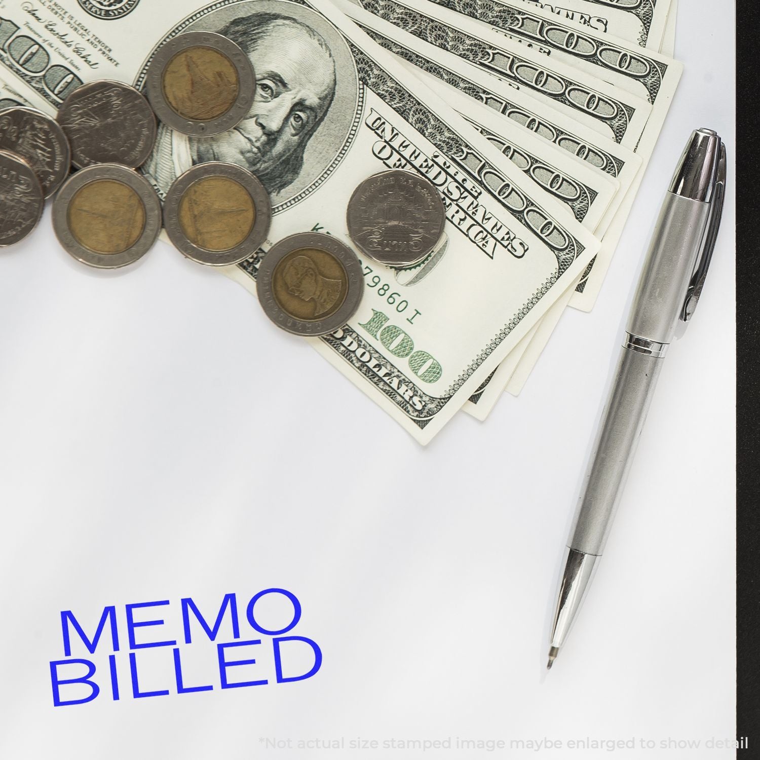 Close-up of U.S. cash with coins and a pen beside stacked $100 bills, illustrating budgeting, money management, and finance.