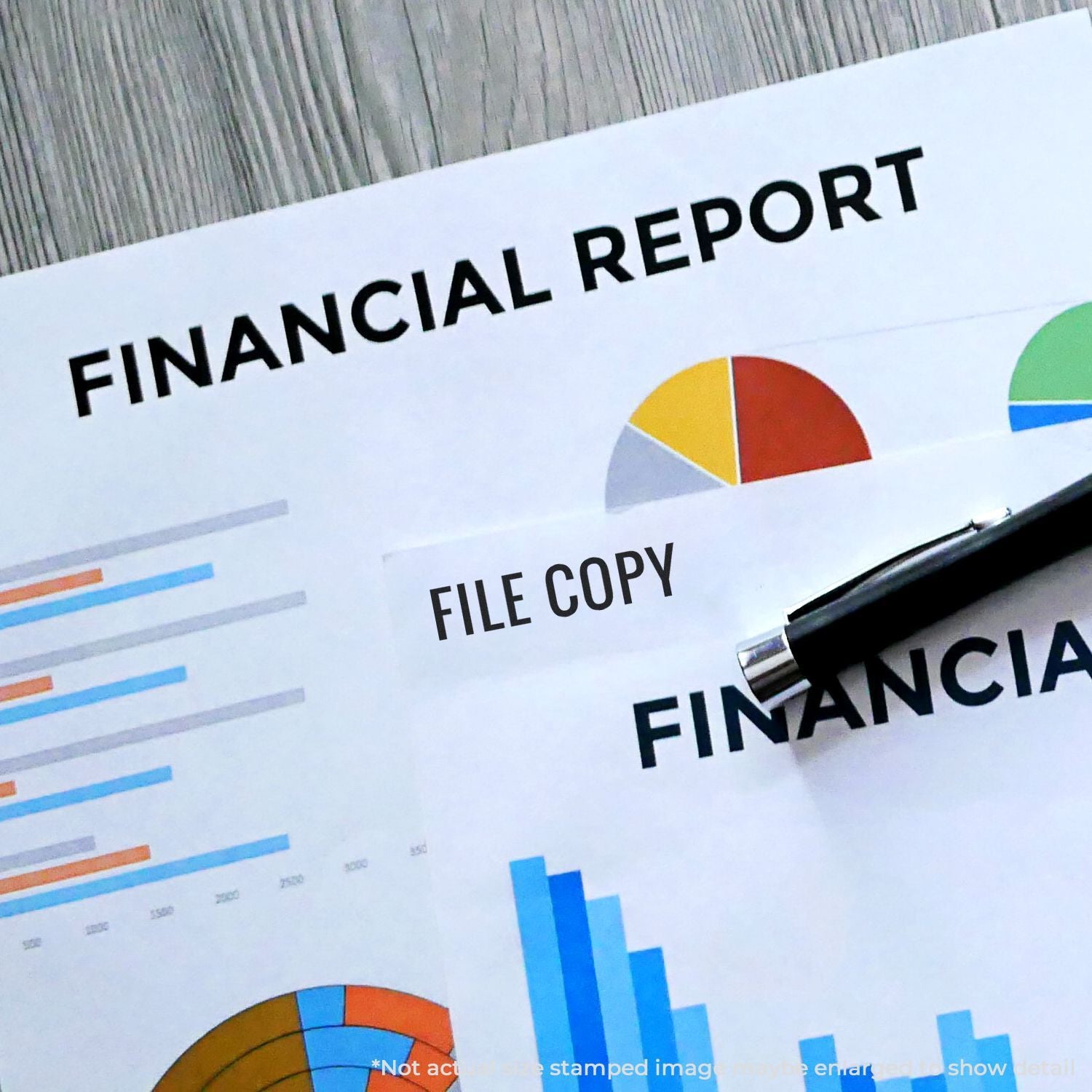 Financial report with colorful charts, pie graphs, and pen on desk for business analytics and accounting review.