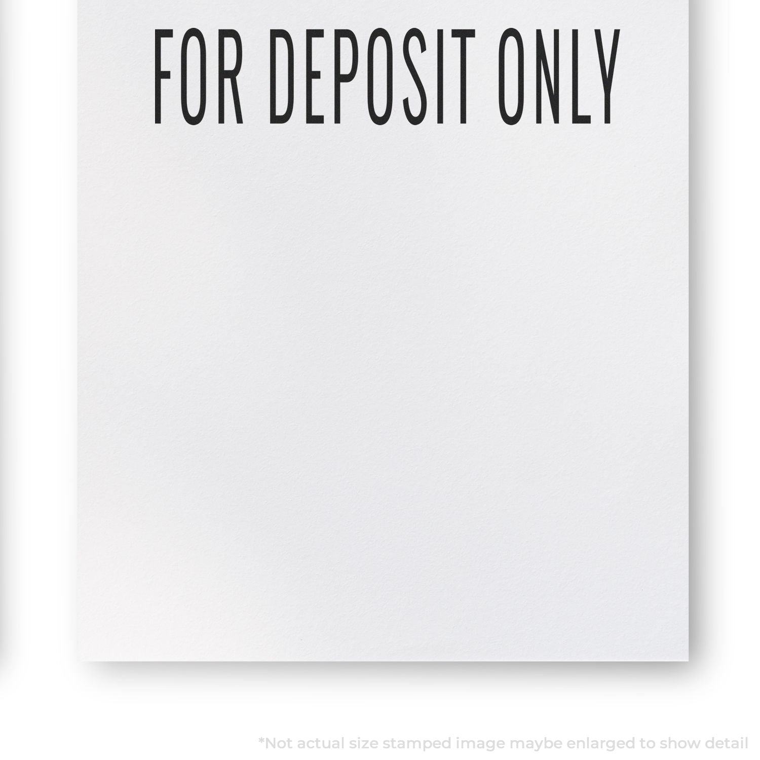 For Deposit Only stamp on white paper, close-up check endorsement text.