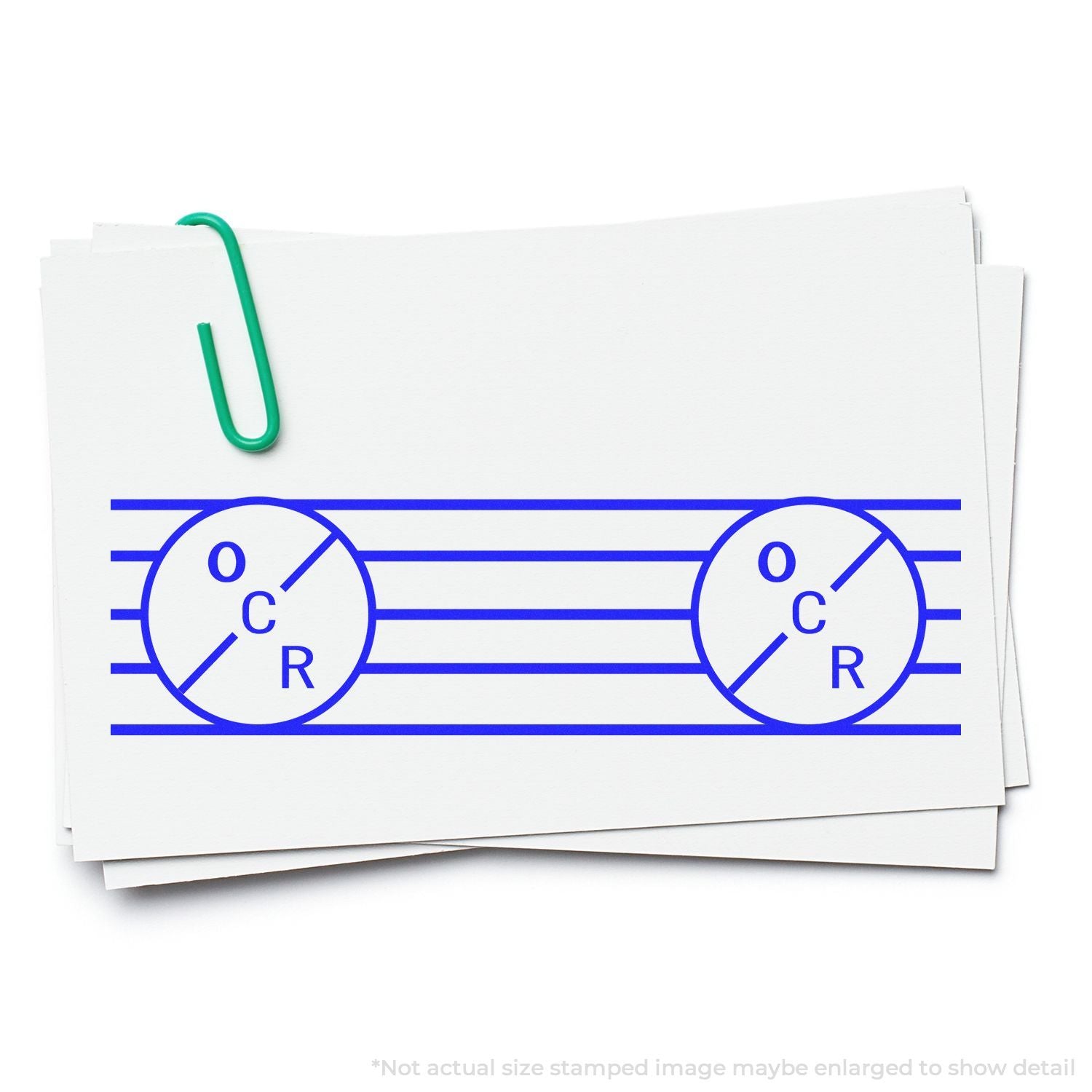 Paper with a blue electrical circuit diagram showing two O?C?R component circles and connecting lines, illustrating circuit wiring.