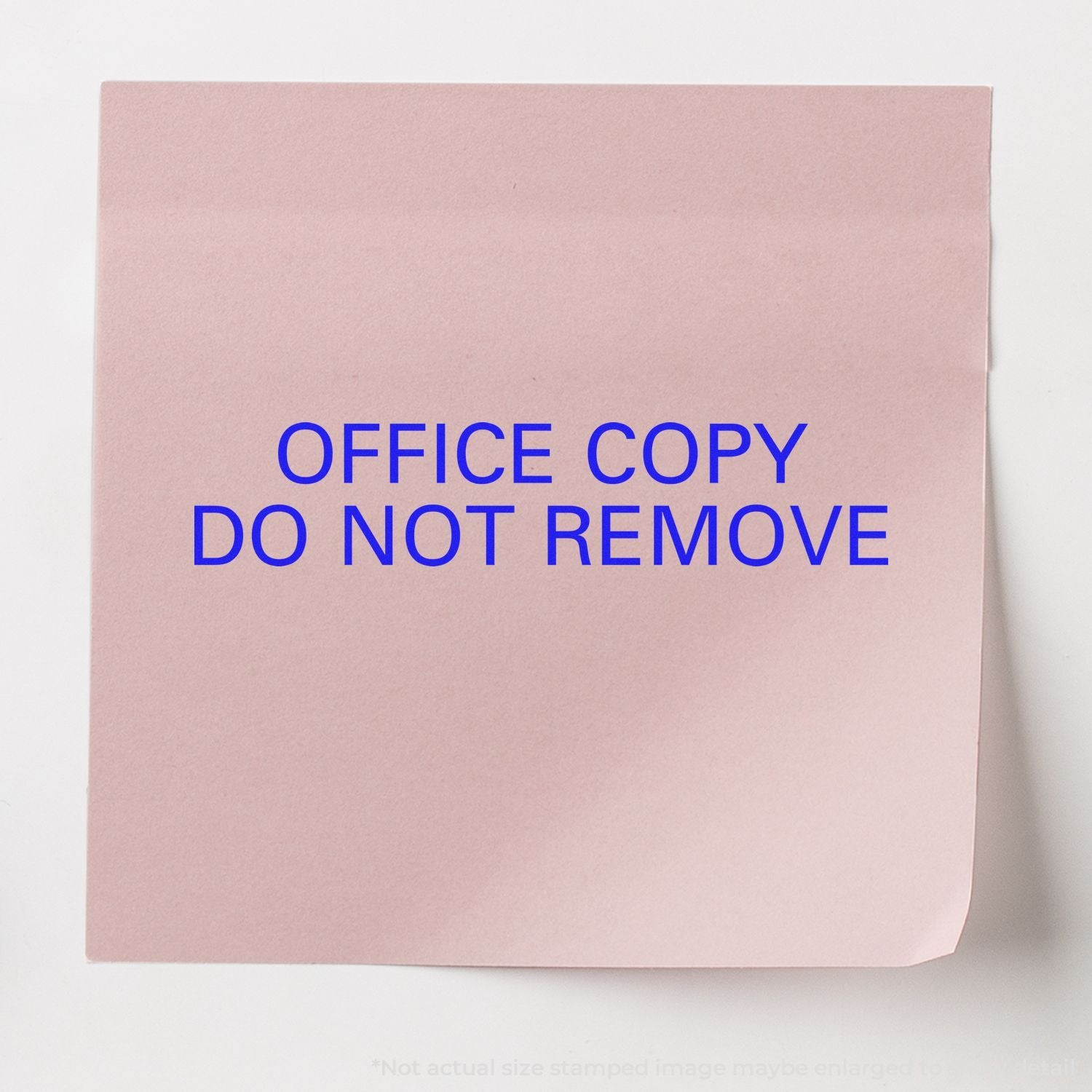 Pink office copy label reading DO NOT REMOVEsecurity notice for office documents, preventing removal and unauthorized handling.