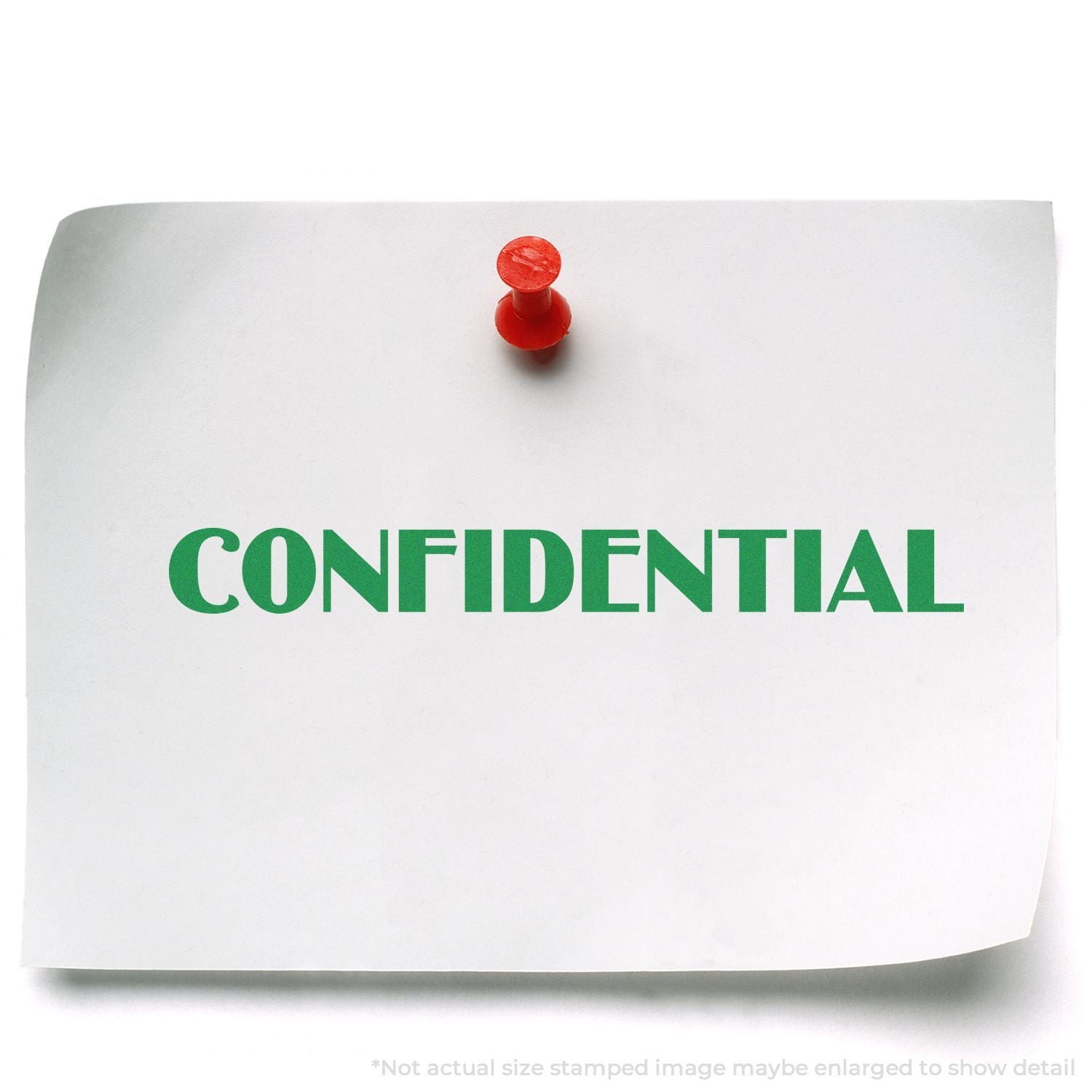 Confidential document note pinned with red push pin on white paper.