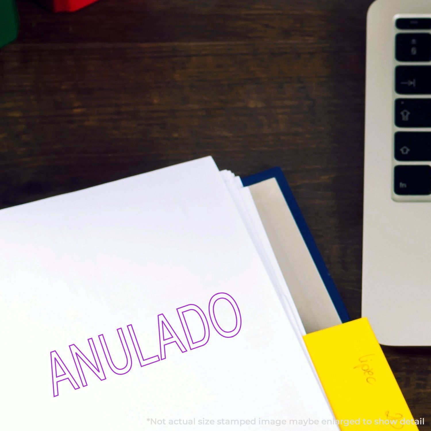 AMUJAL10 discount coupon code on paperwork with phone and laptop on desk, promoting online shopping savings and deals