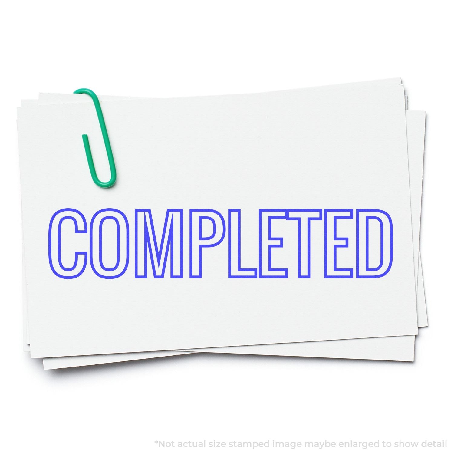 White business cards held by a green binder clip with COMPLIED, a compliance status label for paperwork or policy.