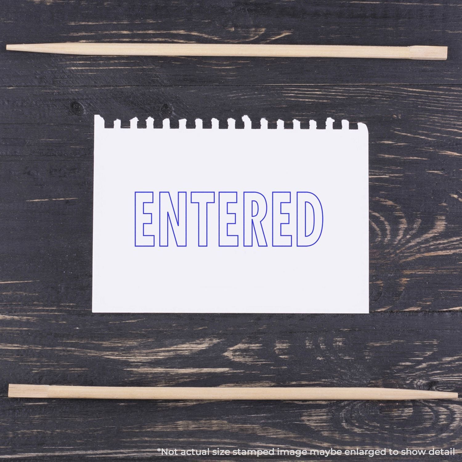 Calendar card on dark wood desk reads ENTERED, indicating document or date status for data entry and workflow tracking management.