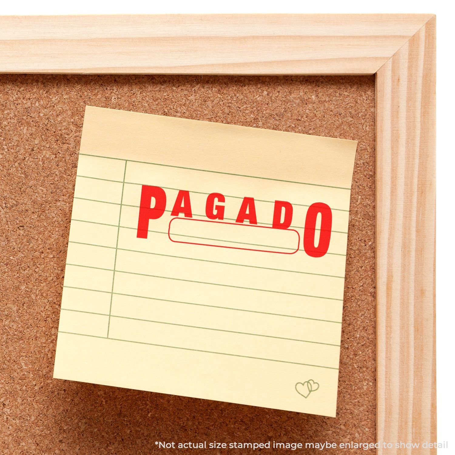 Corkboard pin note stamped PAGA DO 0 showing paid status for an invoice or receipt.