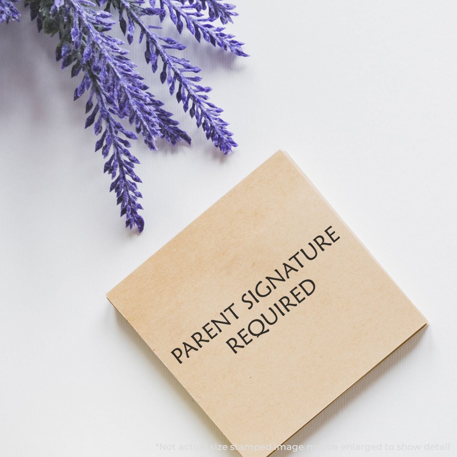Kraft package label reading Signature Required with purple lavender sprigs, conveying delivery signature confirmation.