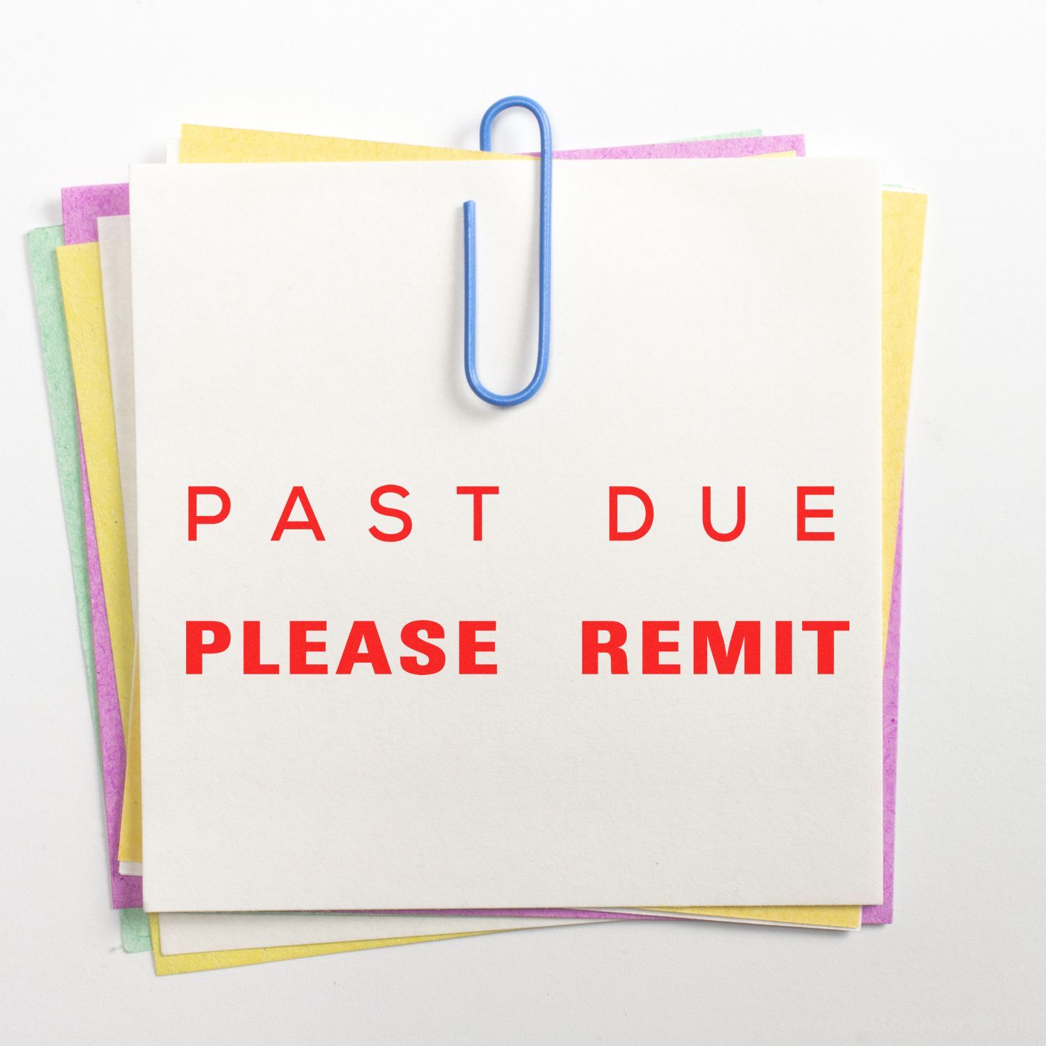 Past due payment reminder memo with paperclip reading PAST DUE PLEASE REMIT for overdue invoice or bill payment.