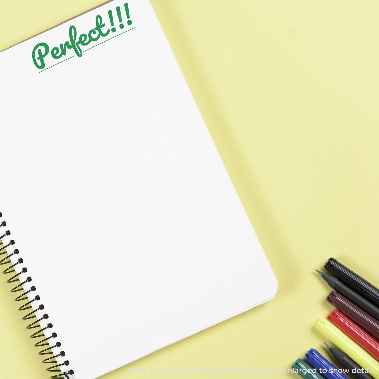 Open notebook with Perfect!!! note and colorful pensideal for school planning, writing, and motivational inspiration.
