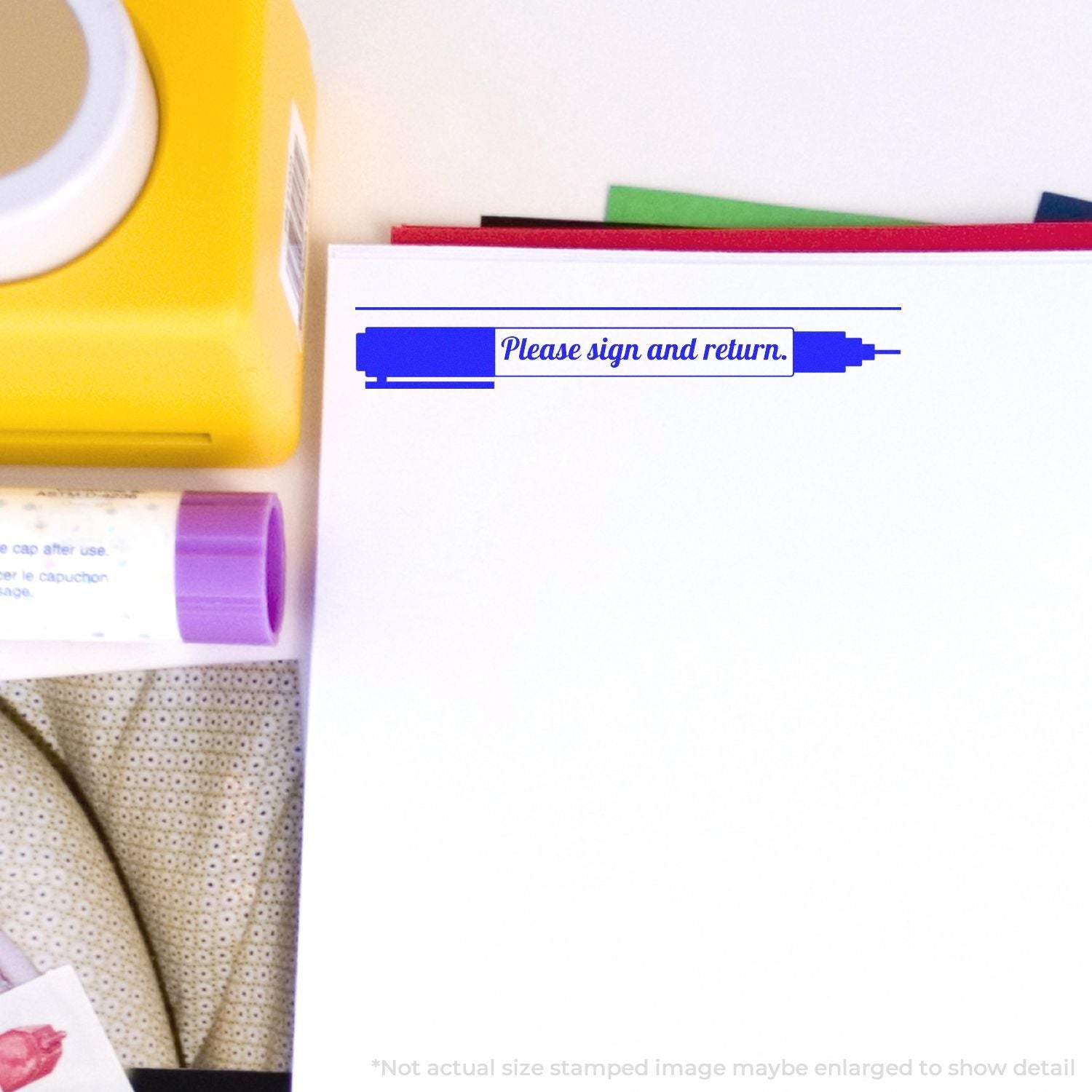 Office paperwork with Please sign and return stamp on a blank document folder, close-up stationery image