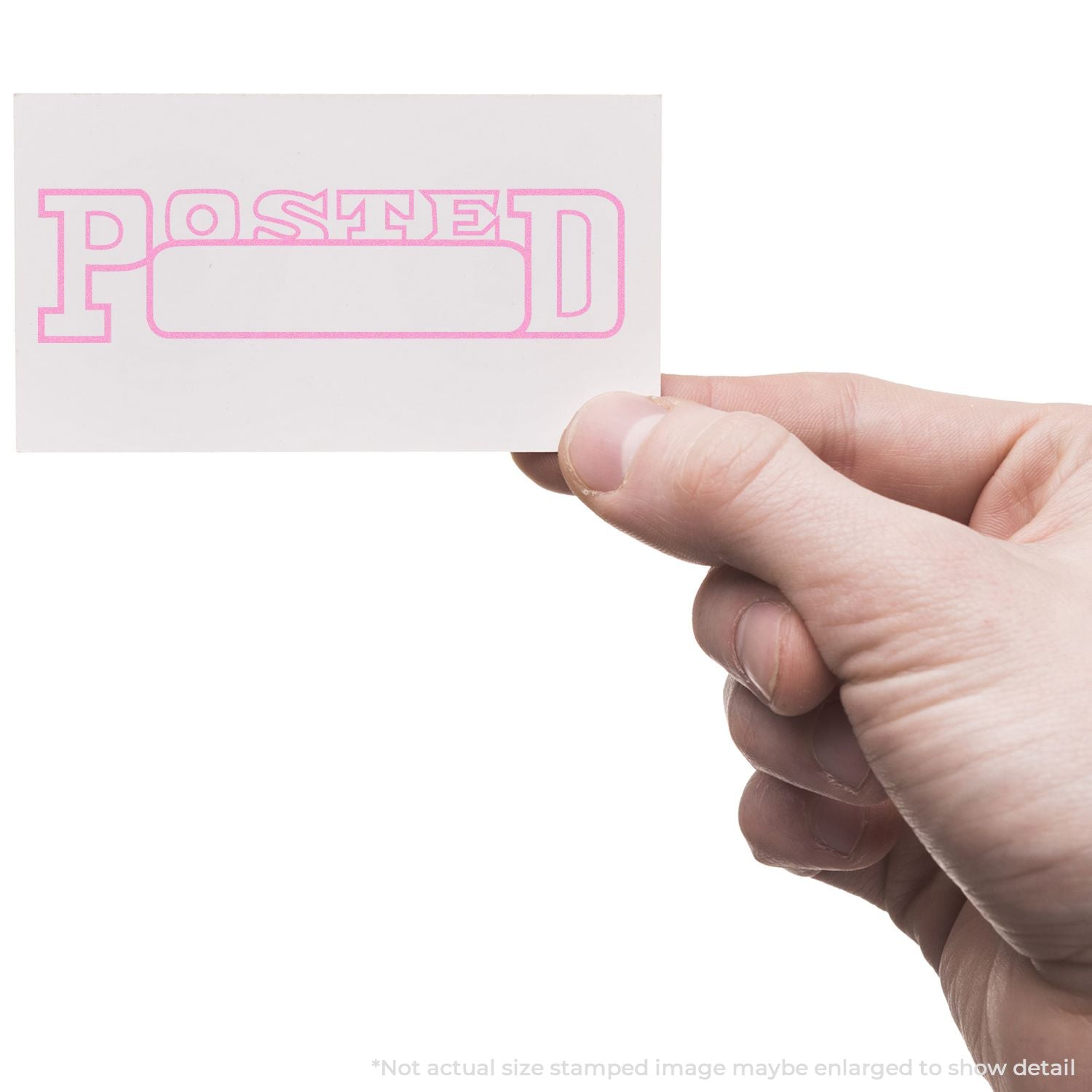 Hand holding a POSTED rubber stamp, indicating paperwork has been marked for mailing or publication.
