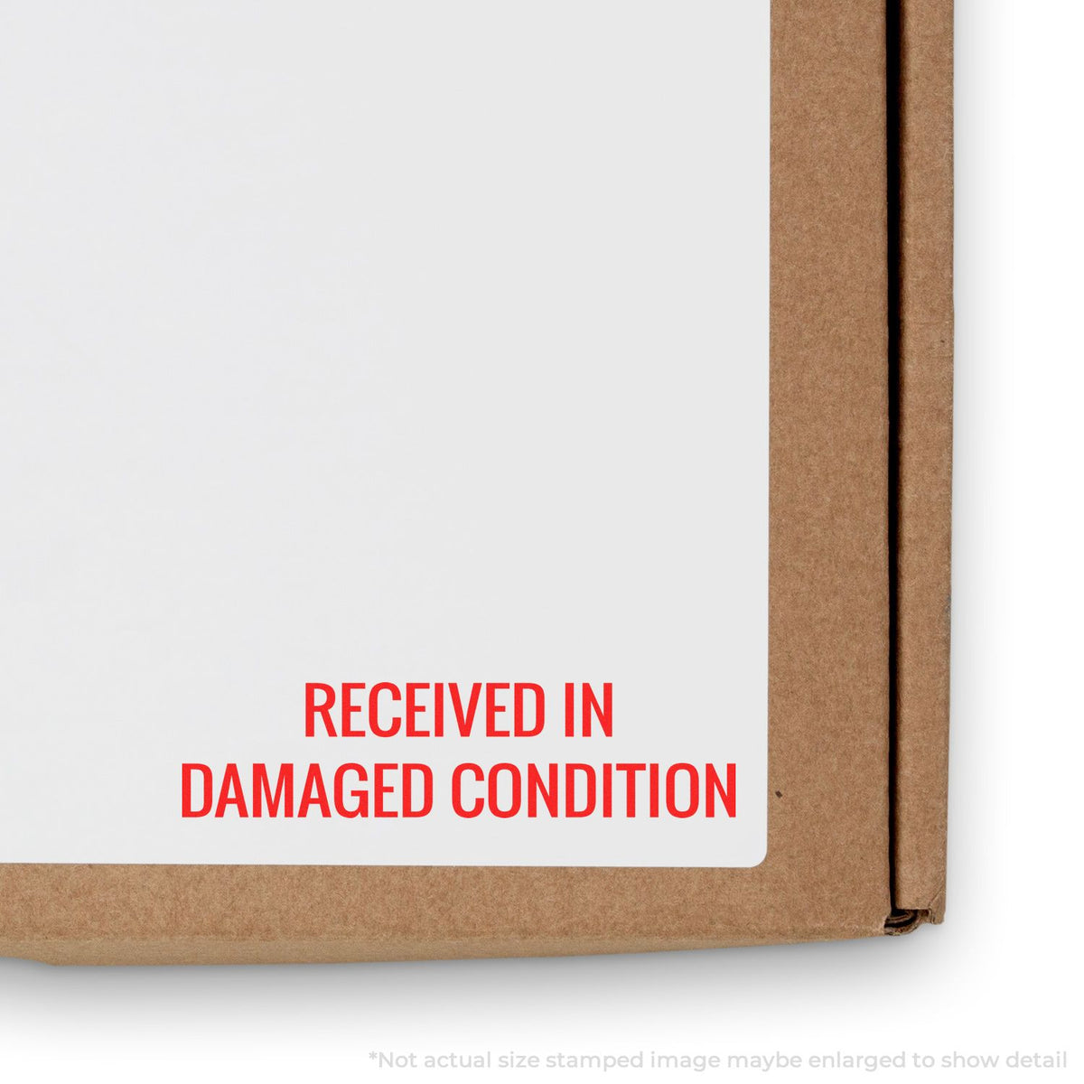 Shipping package received in damaged condition, warning label on brown parcel for freight damage claims and returns.