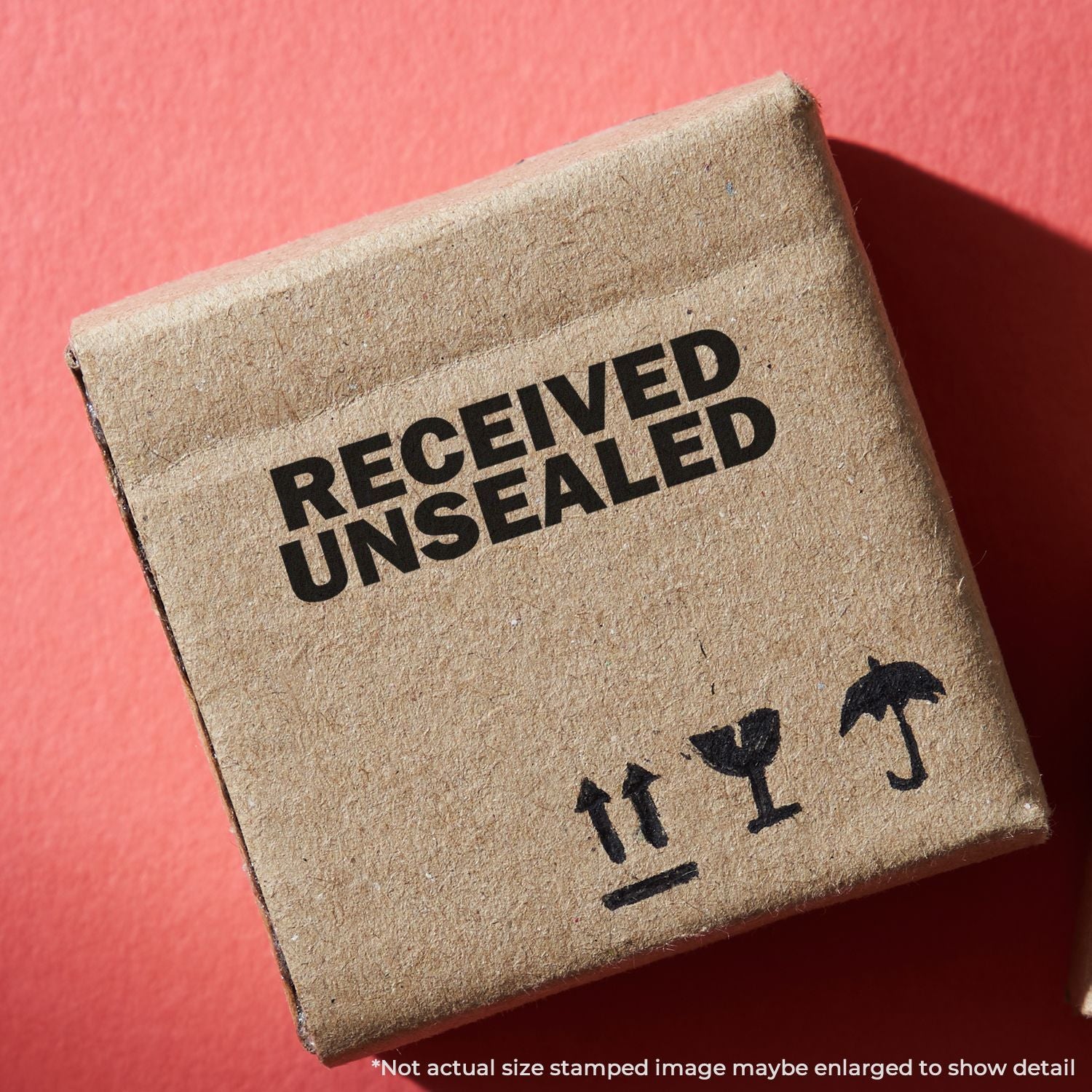 Close-up of stamped mail mark reading RECEIVED UNSEALED, showing an unsealed package receipt on beige paper.