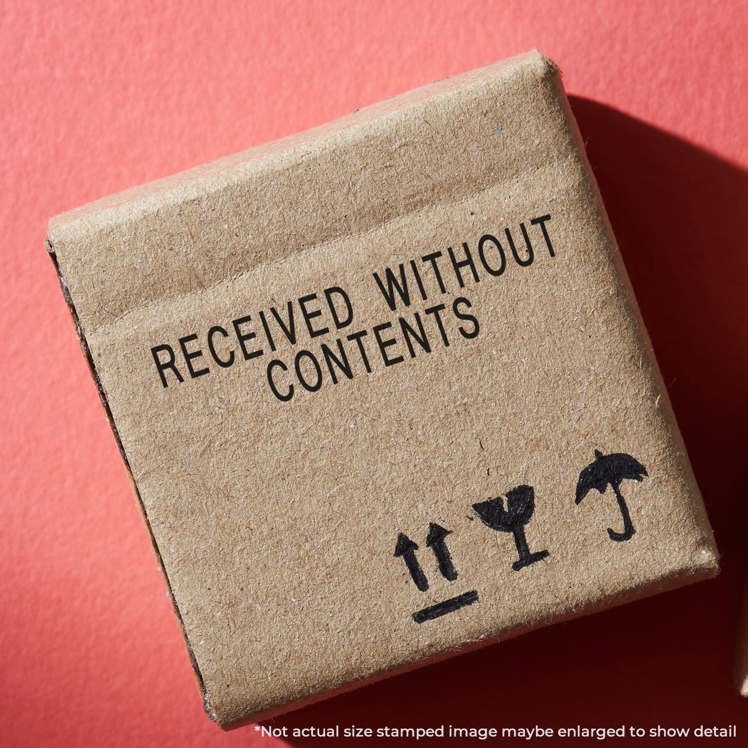Close-up of the Received Without Contents postal stamp on a brown package label, documenting missing items and returns.