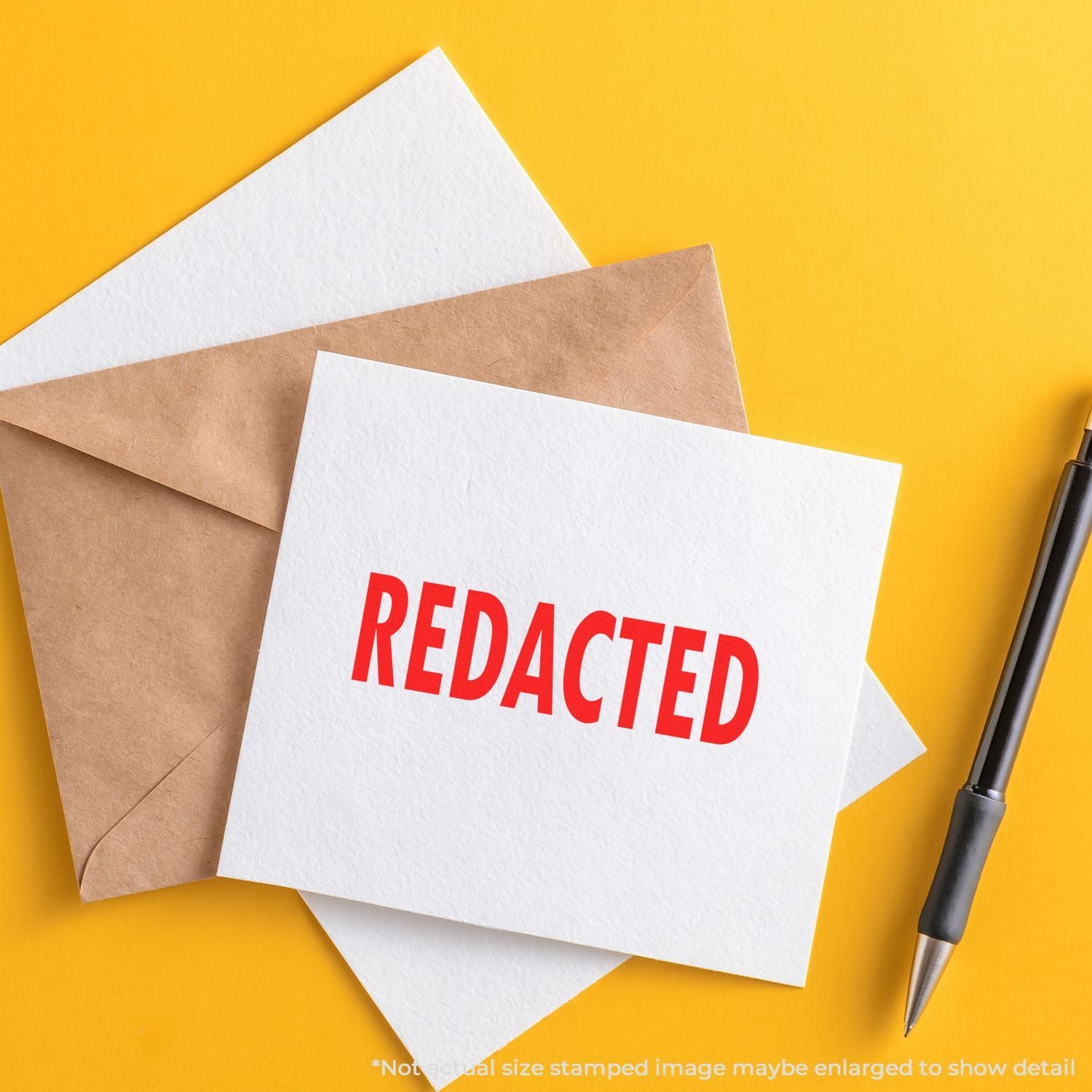 Redacted stamped document on envelopes with pen on yellow background, privacy and confidential information concept.