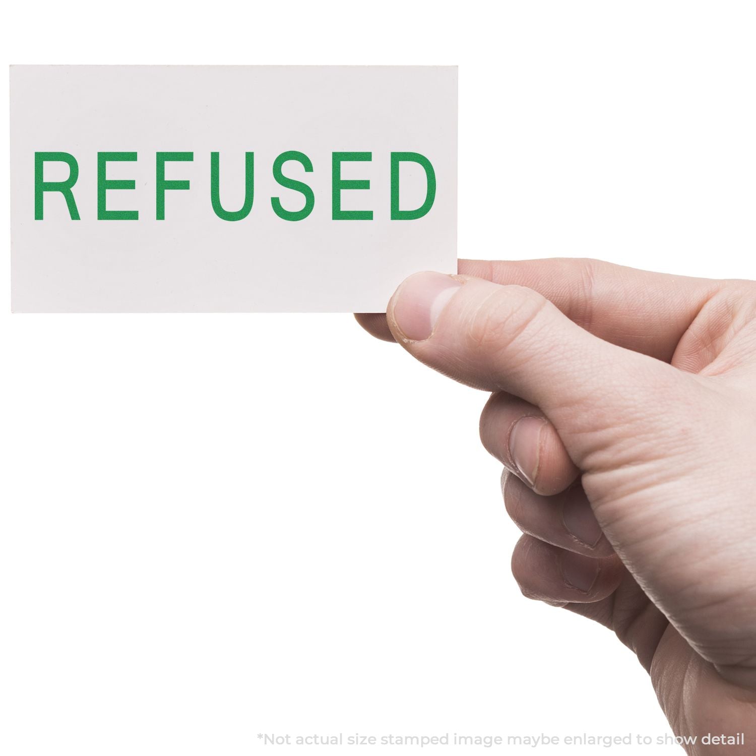 Hand holding a REFUSED stamp card, symbolizing document rejection, denial, or refusal.