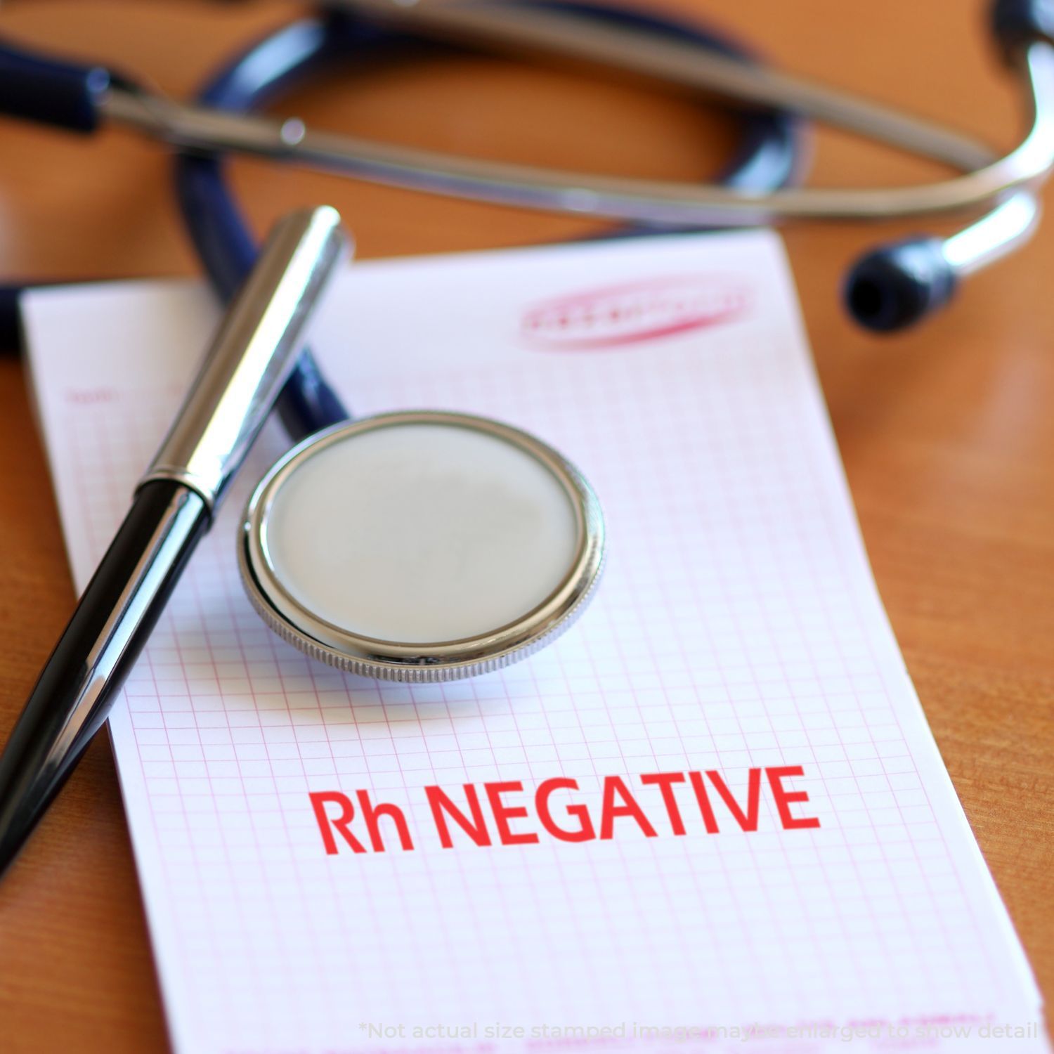 Magnifying glass over Rh NEGATIVE blood test form with stethoscopehealthcare reference for Rh negative blood type diagnosis.