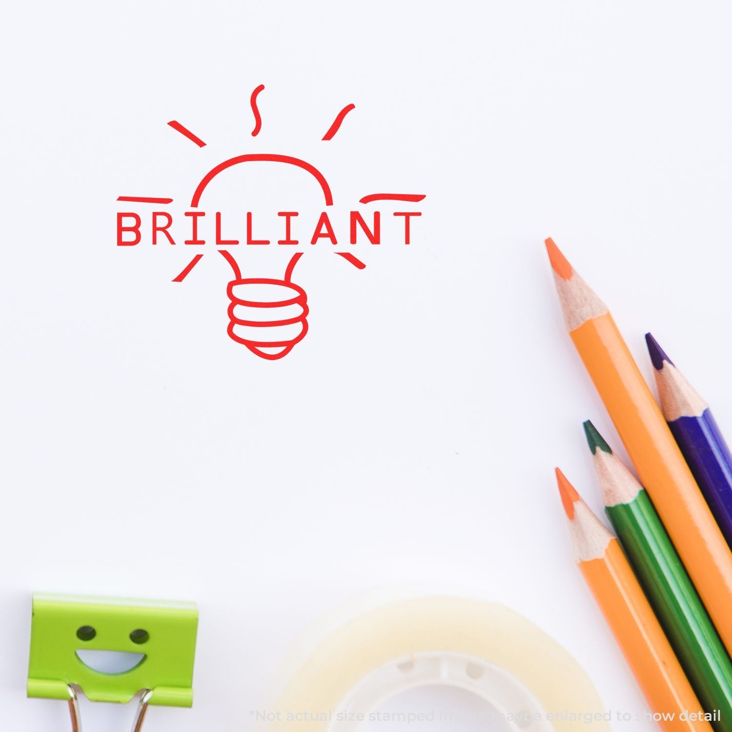 Creative branding concept with red lightbulb icon, BRILLIANT text, and colorful pencils on a white background.