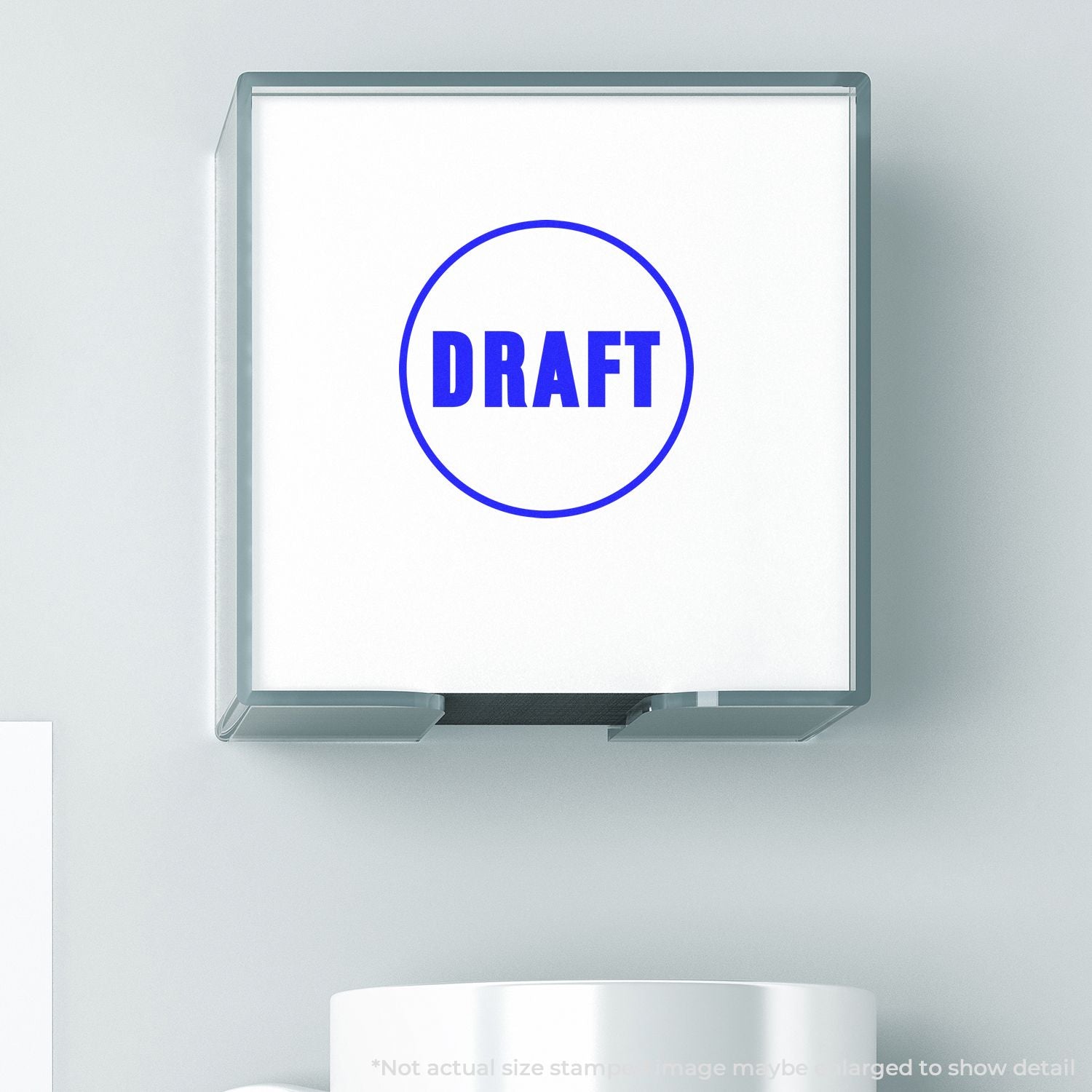 Blue draft stamp icon in a clear plastic holder on a white background.