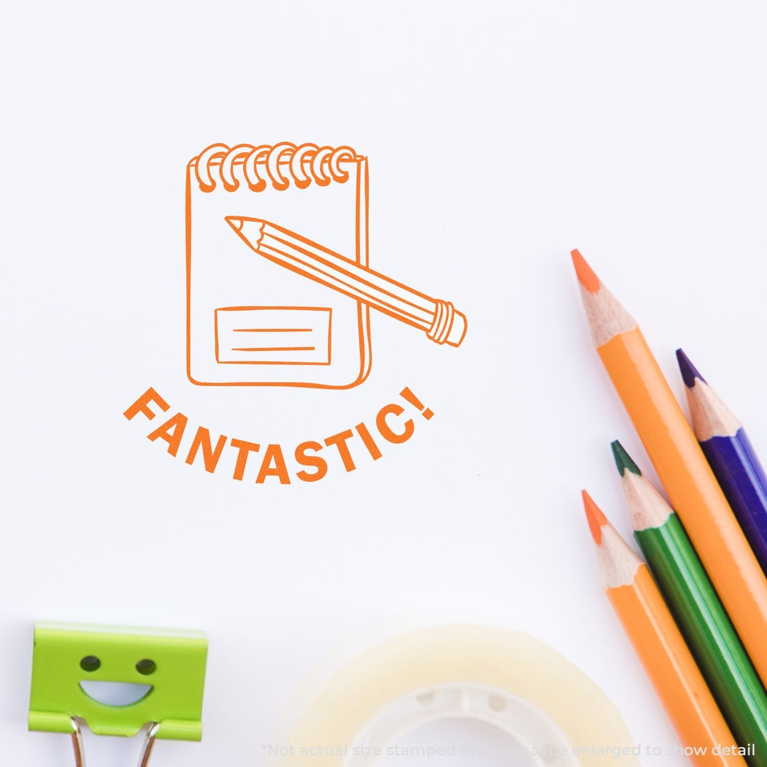Orange notebook and pencil illustration with FANTASTIC! text, surrounded by colorful pencils on a white background, creative stationery concept.