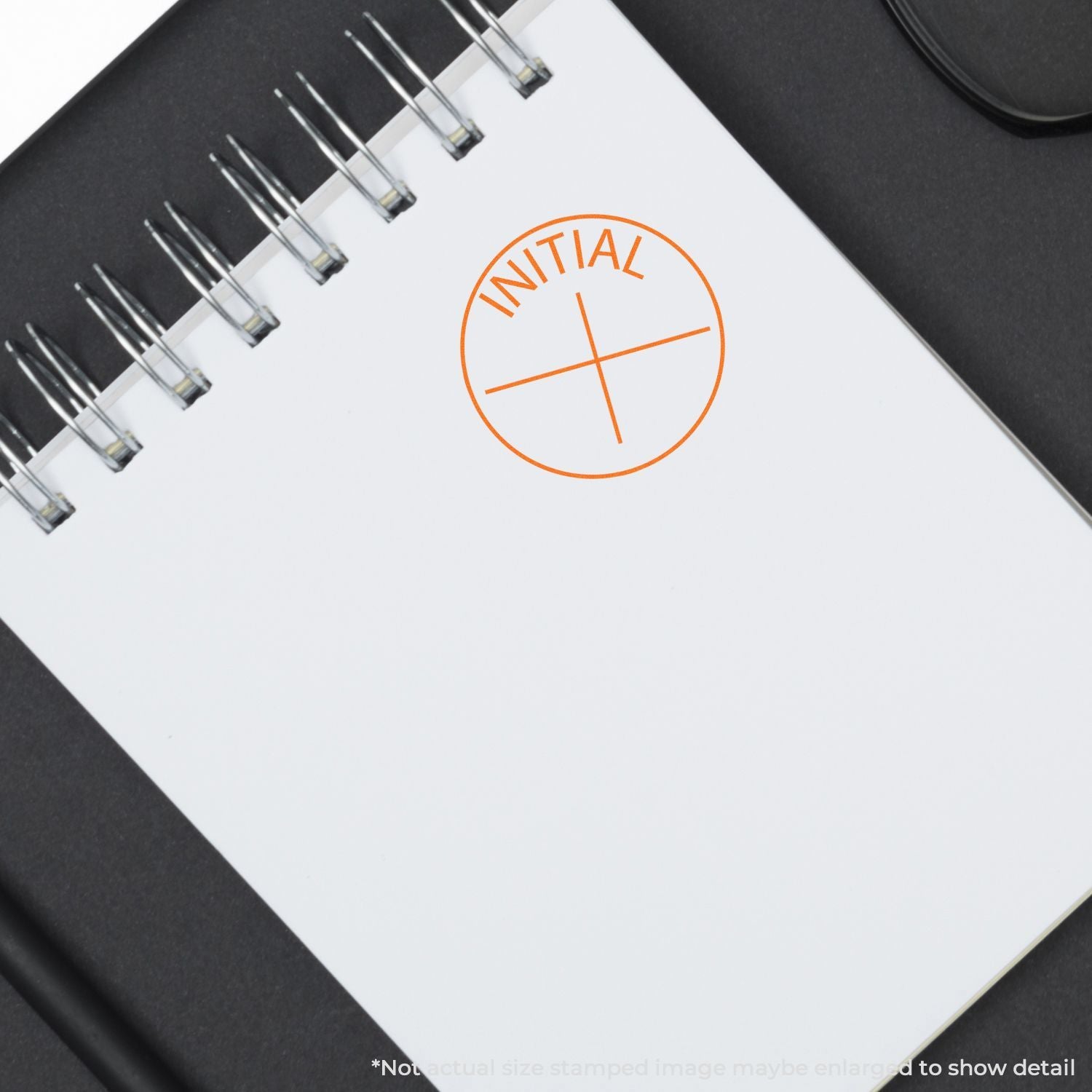 Blank spiral notebook with orange initial logo stamp on white cover, minimal office stationery mockup thumbnail