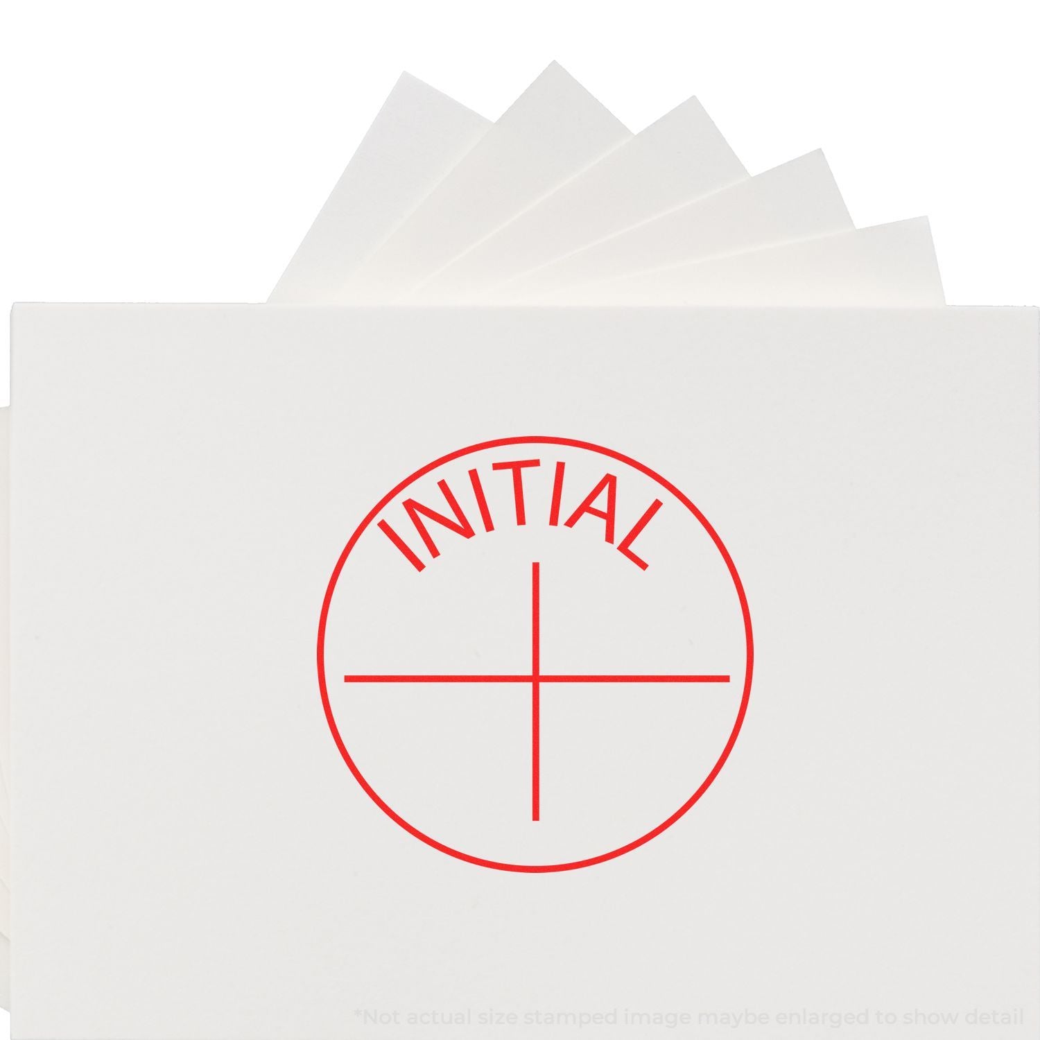 White paper envelope with red INITIAL stamp and crosshair marking on the front.