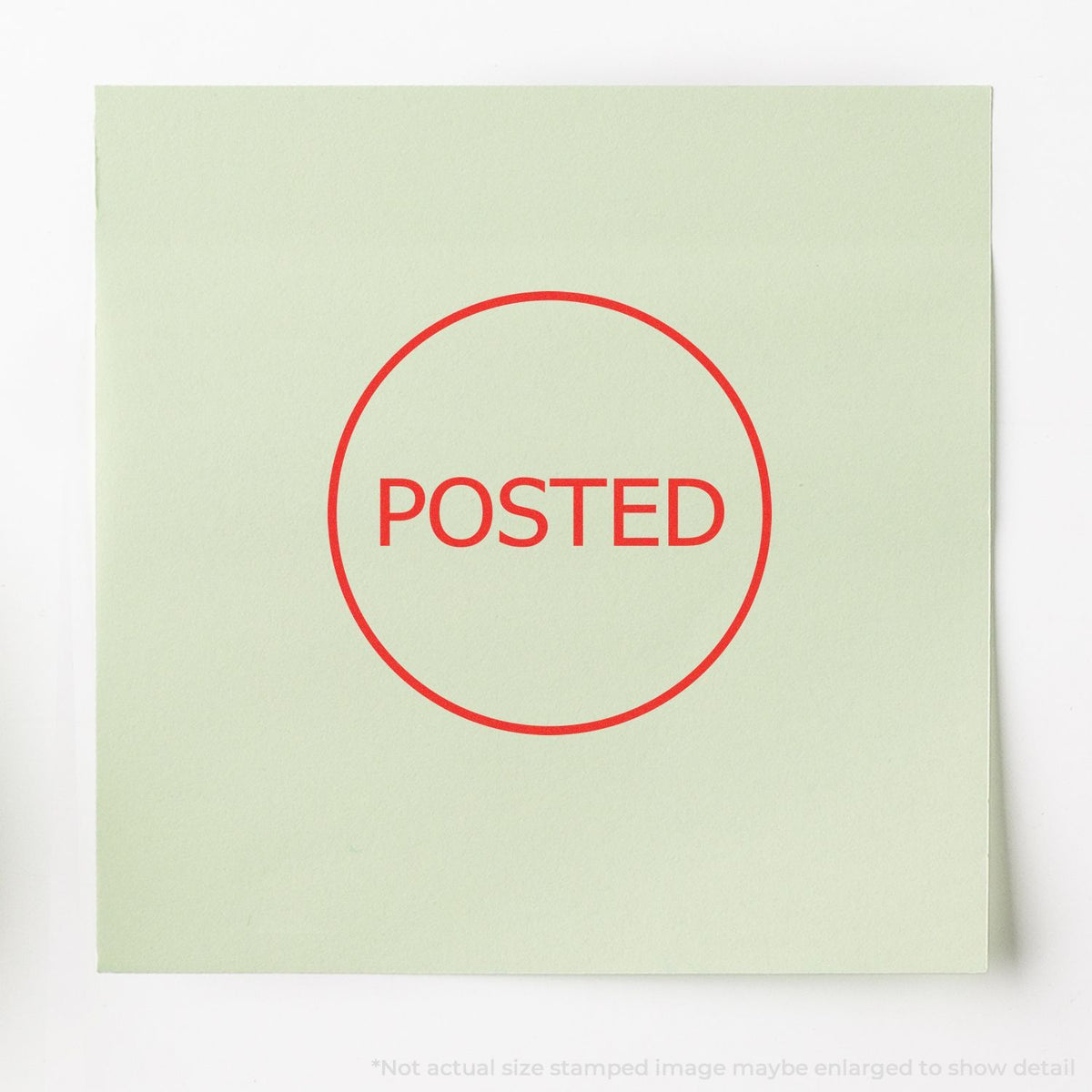 Posted postal stamp mark on pale green envelope, indicating an item has been mailed and processed for delivery in the postal system.