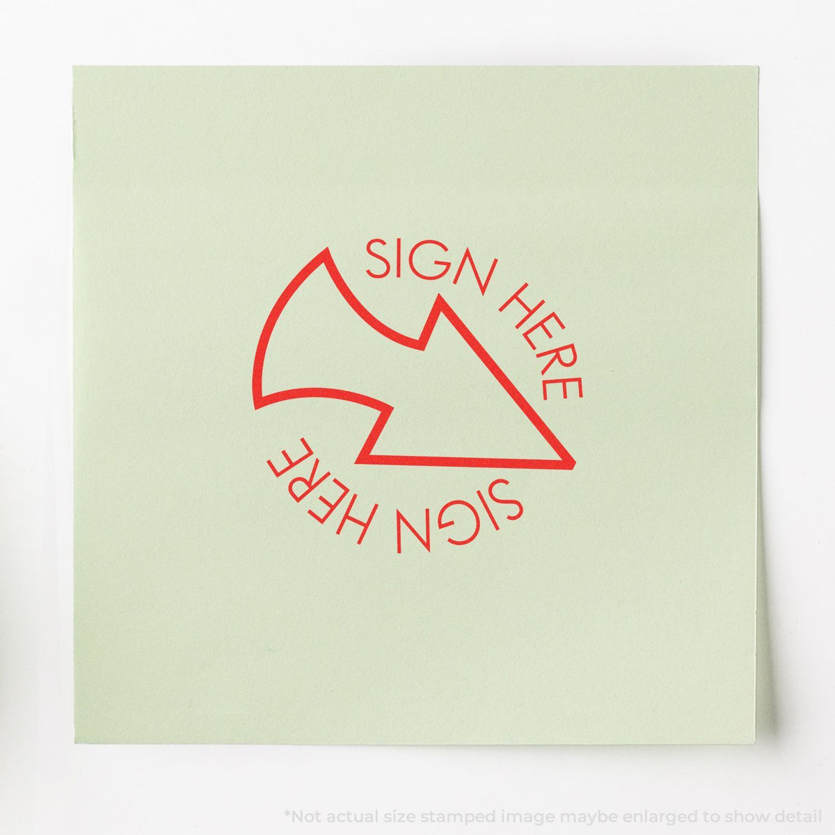 Sign here document stamp with red arrow and SIGN HERE text on light green paper for signing instructions.