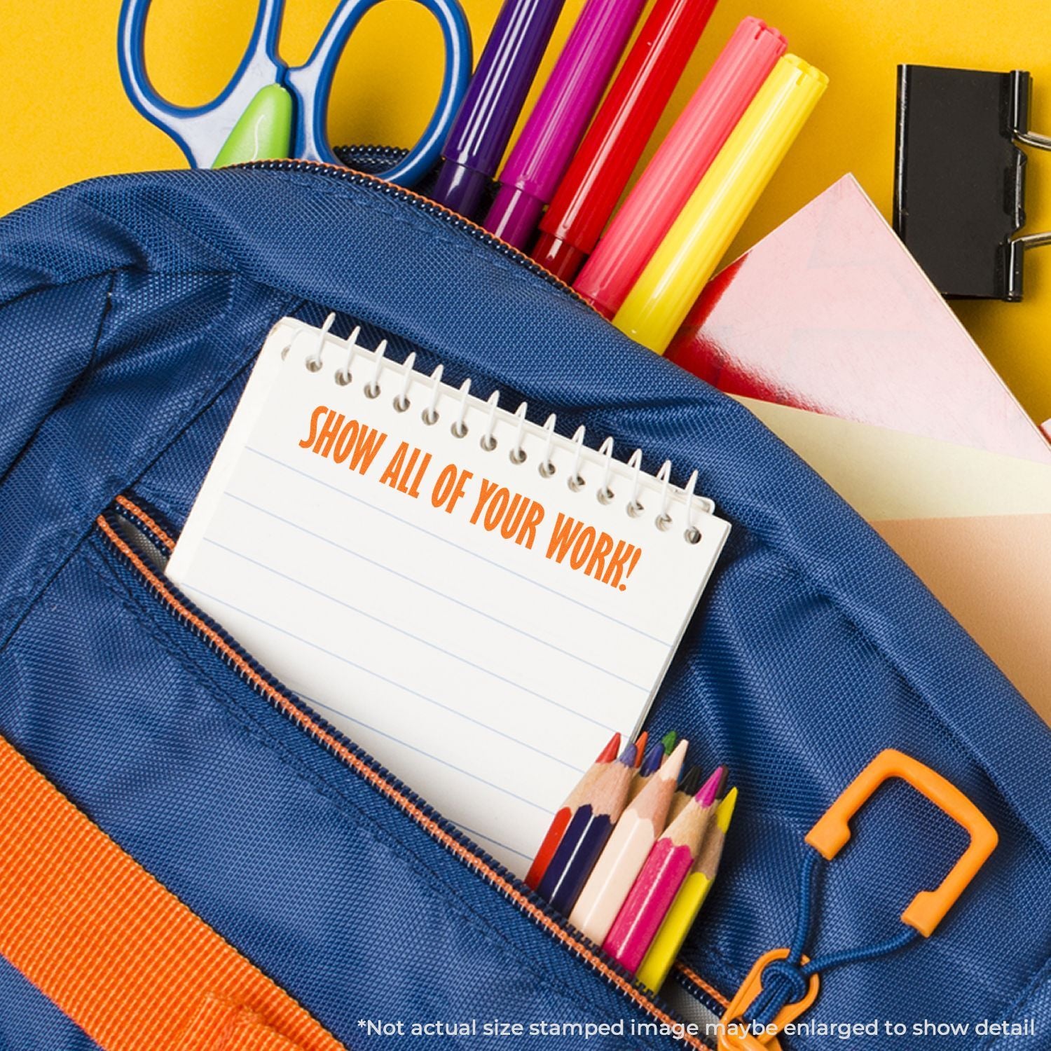 Back-to-school student supplies in a blue pencil case with notebook prompt Show All of Your Work and colorful pencils for homework.