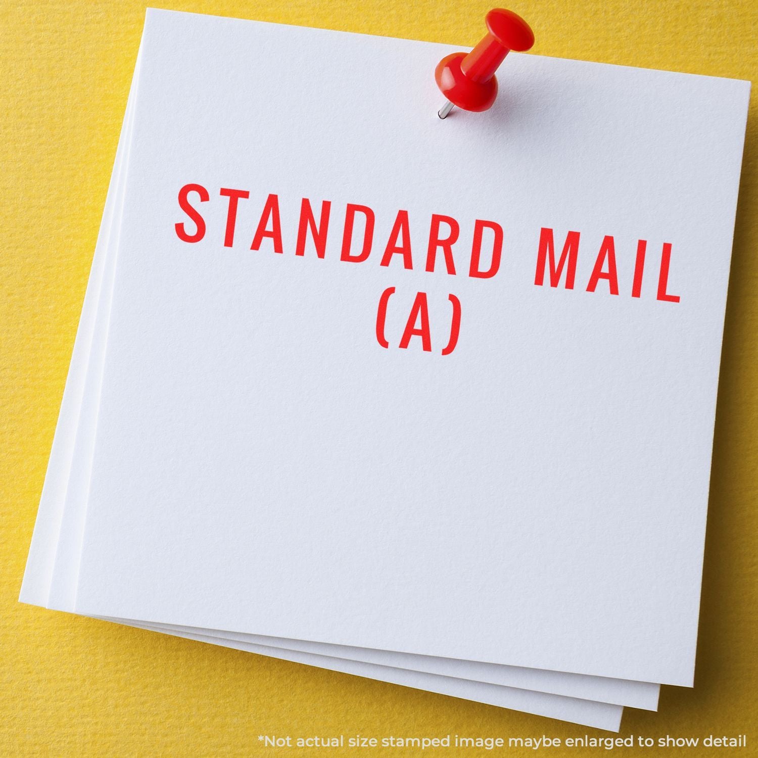Standard Mail (A) card with red pushpin on yellow background, labeling USPS standard mailing classification.