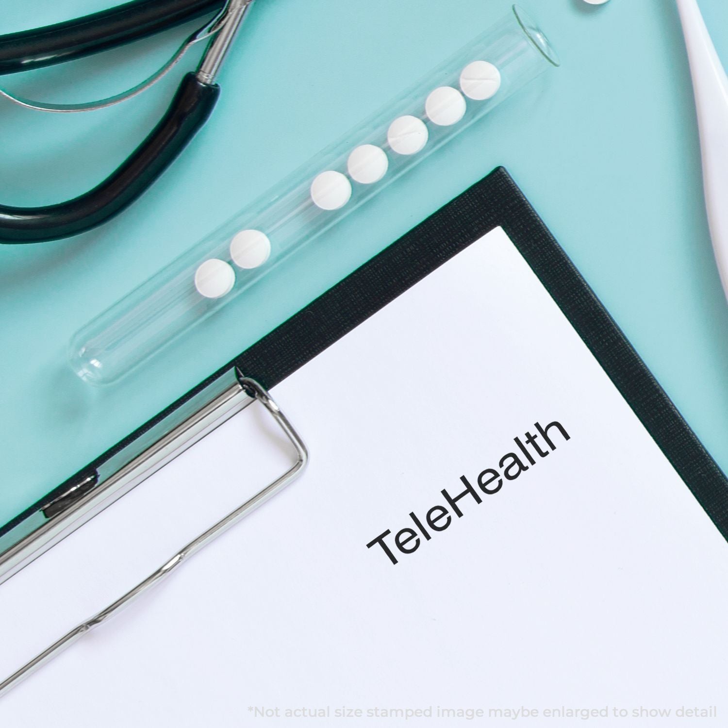 Telehealth planner binder with pen and TeleHealth label for remote healthcare appointments and patient documentation.