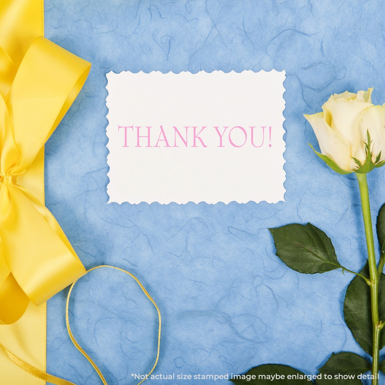 Elegant thank you card with yellow ribbon, white rose, and pink THANK YOU! text on a blue textured background.