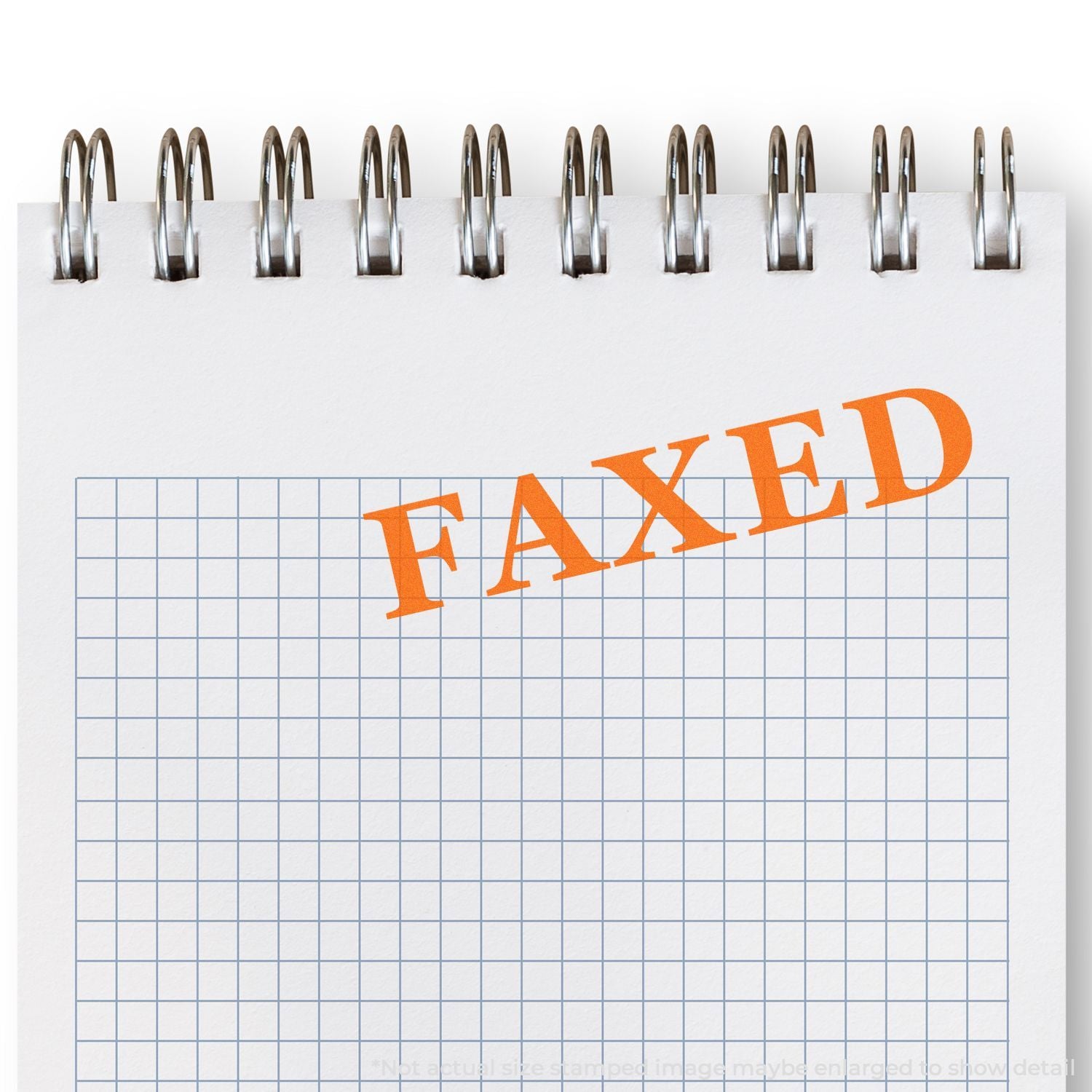 Spiral notebook page with orange FAXED stamp on graph paper, symbolizing a faxed document or office communication.
