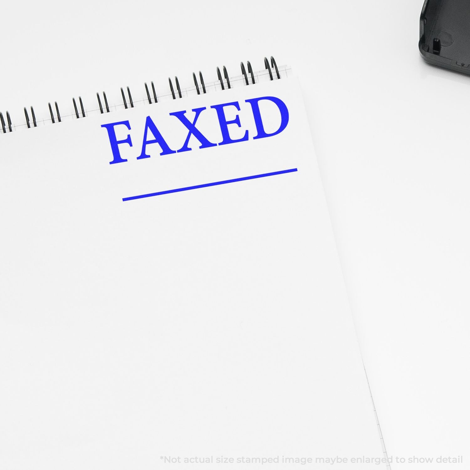 FAXED stamp on document paper in blue, illustrating confirmation that a fax message was sent