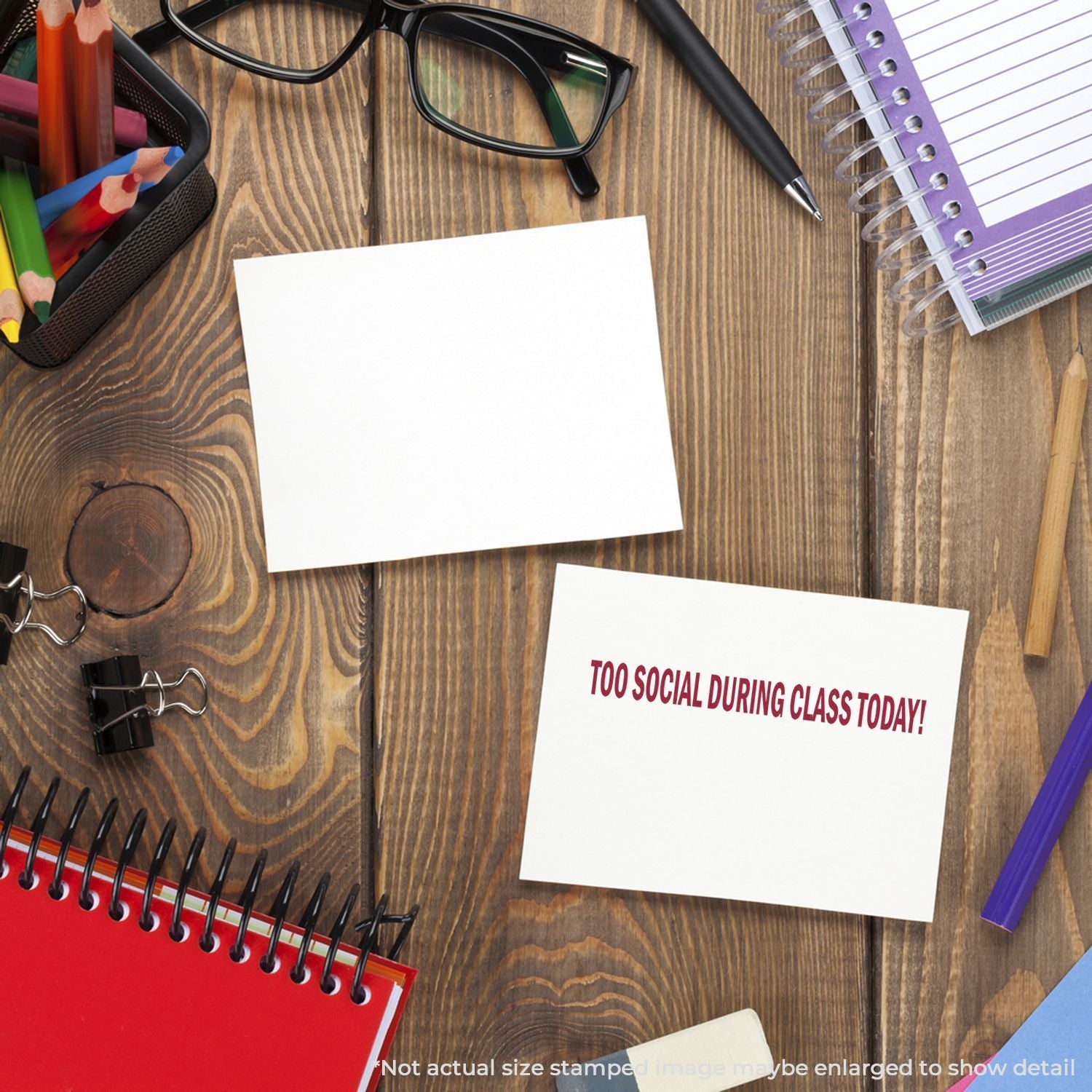 Study desk flat lay with blank notes and Too Social During Class Today! warning sign promoting classroom social etiquette rules.