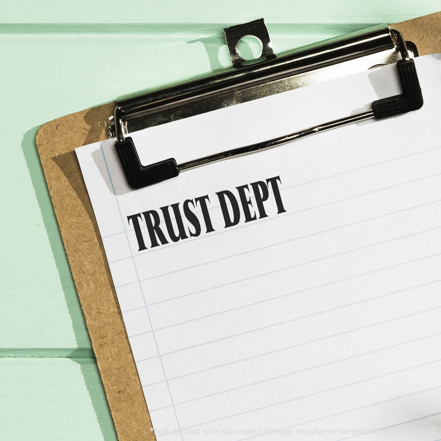 Clipboard note stamped Trust Debt highlighting financial debt, credit risk, and trust issues in a loan document.