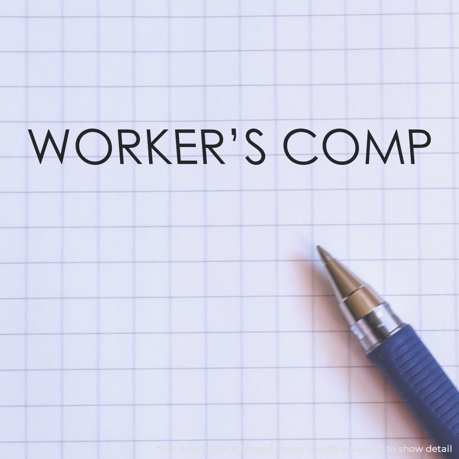 Grid notebook page with WORKERS COMP and pen, highlighting workers compensation insurance for workplace injury claims.