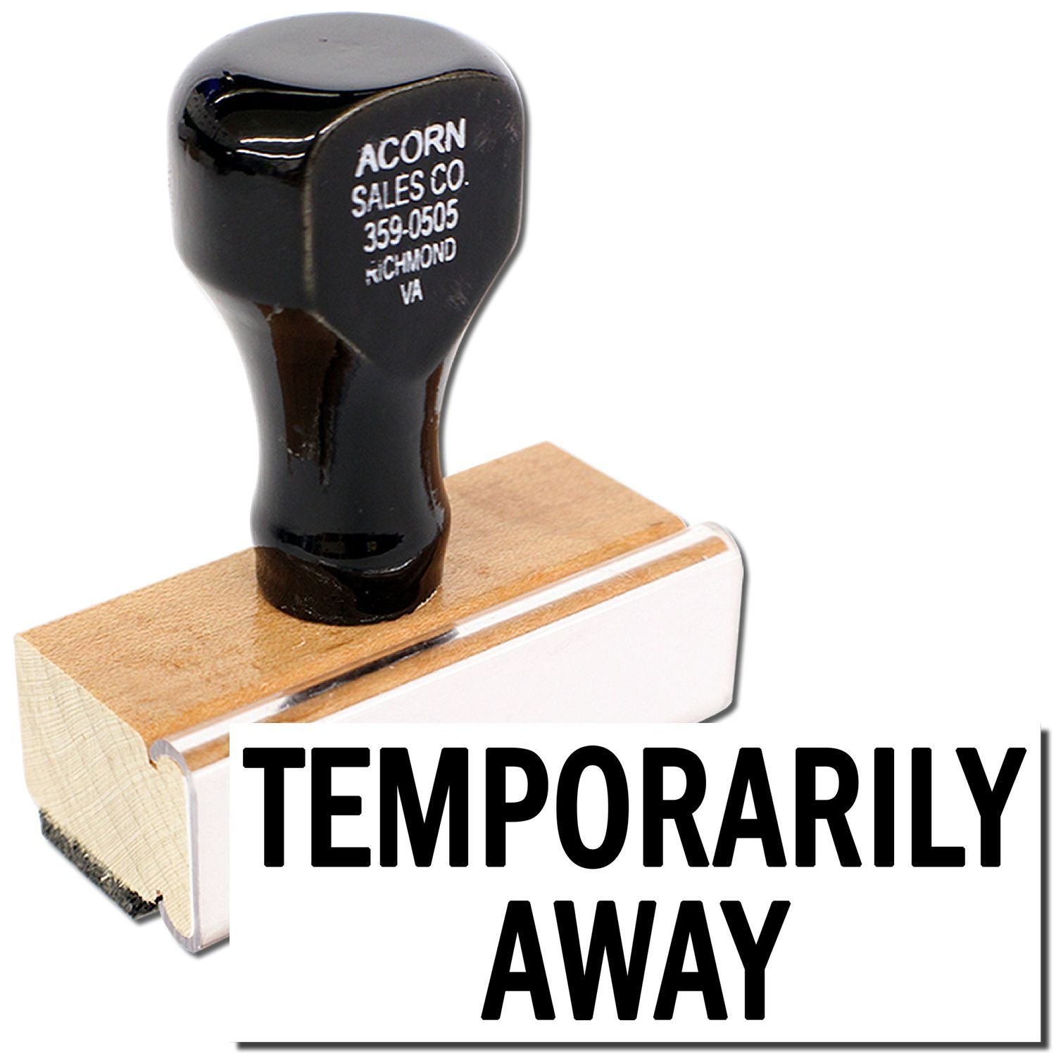Temporary away self-inking rubber stamp with black handle and wooden base on white background