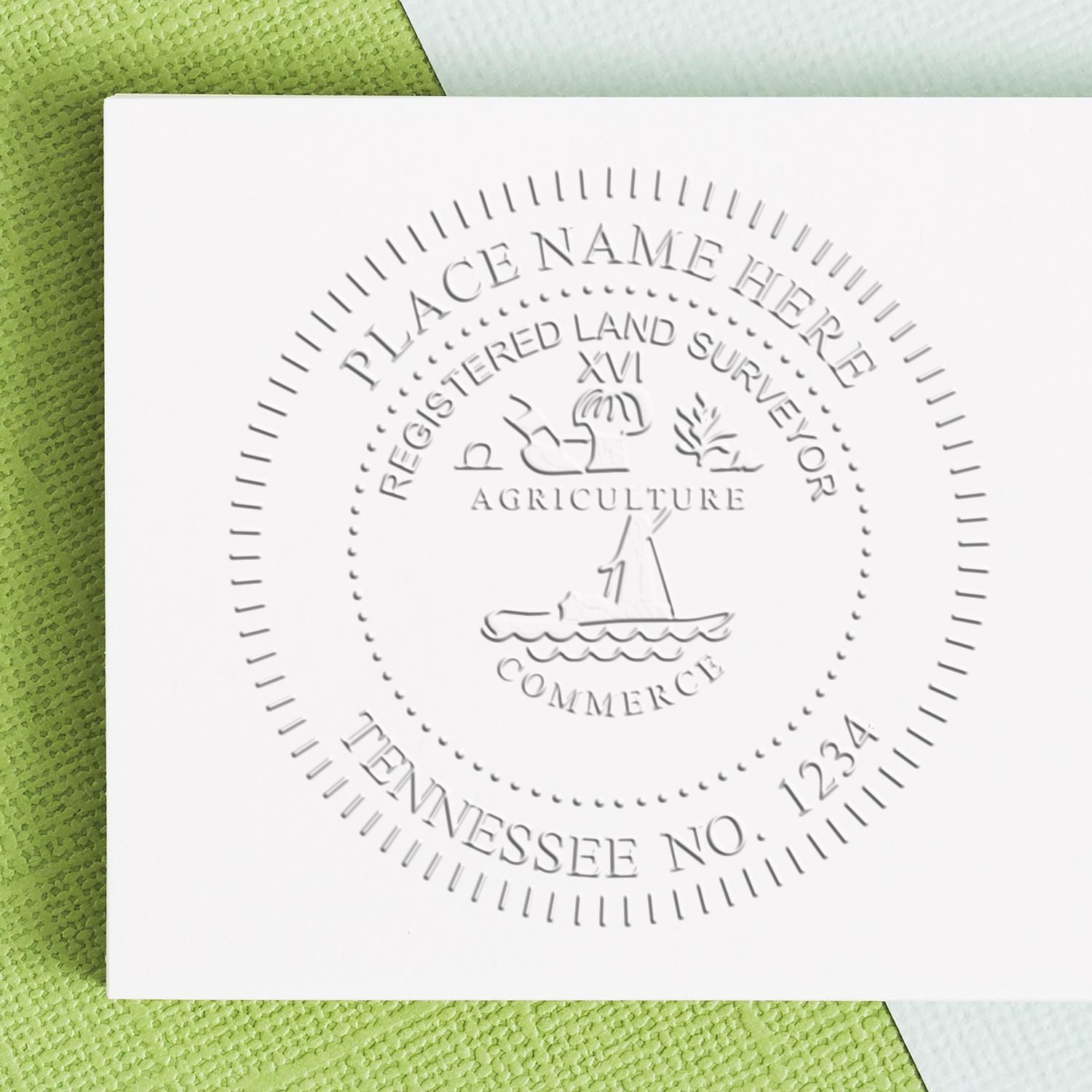 Embossed Tennessee land surveyor seal on white paper with agriculture and commerce emblem, close-up official document stamp.