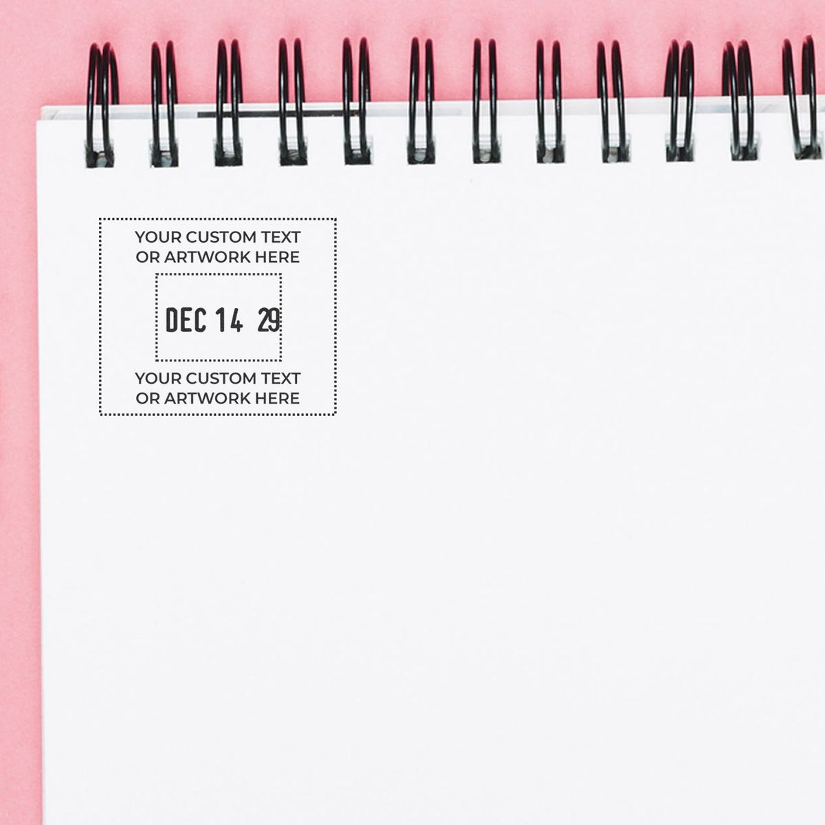 Spiral-bound notebook mockup with custom text placeholder and date stamp on a pink background, ideal for planner or stationery design.