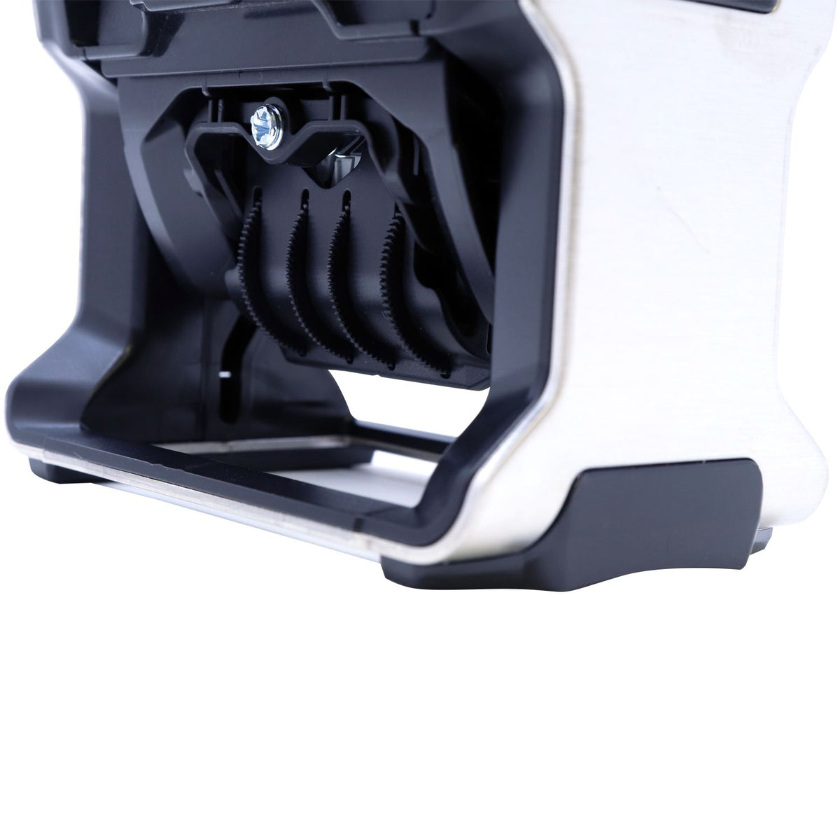Close-up of a cordless electric foil shaver head with precision blades and modern silver-black design.