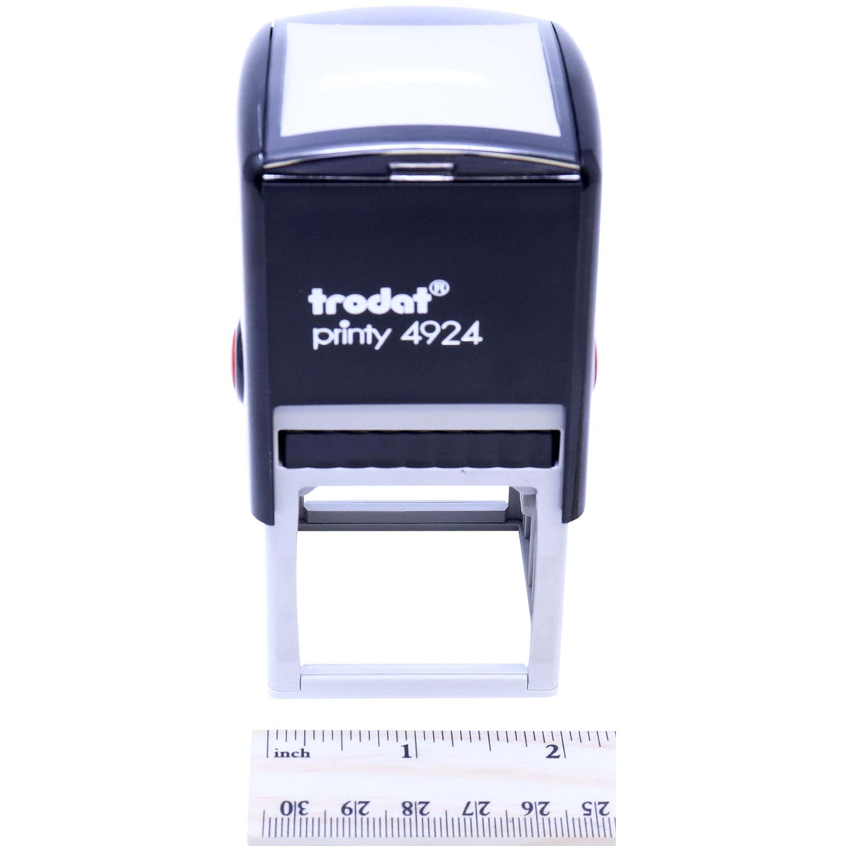 Trodat Printy 4924 self-inking rubber stamp with ruler for size reference on white background