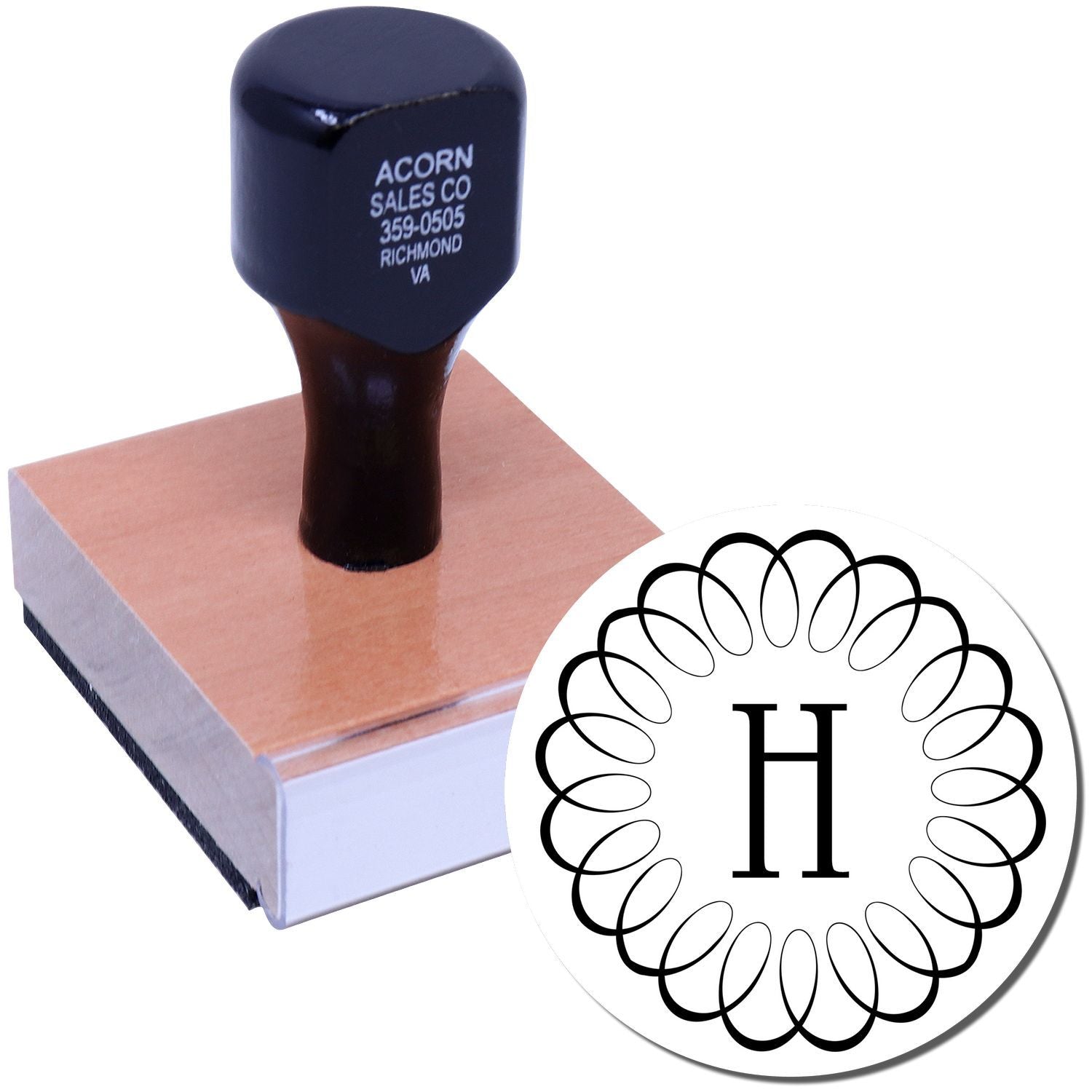 Acorn Sales Co blue rubber stamp on box with 'H' paw-style logo, used for branding and labeling services